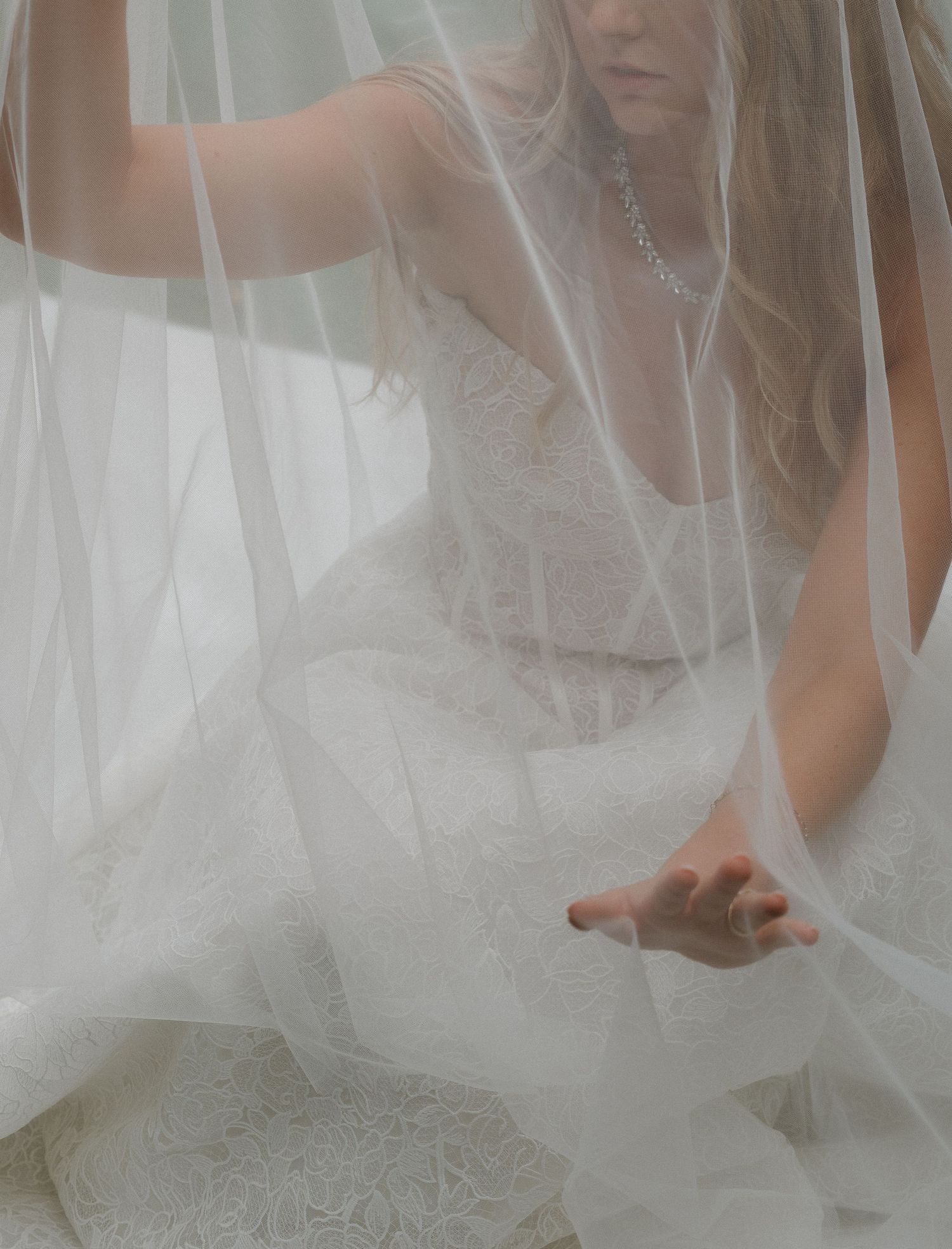 Bride looking beautiful under the veil