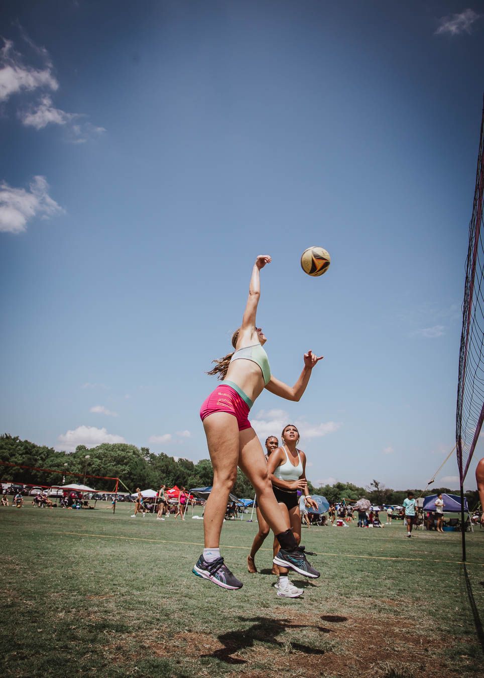 Athletes competing during Spikefest volleyball tournament Allen Texas