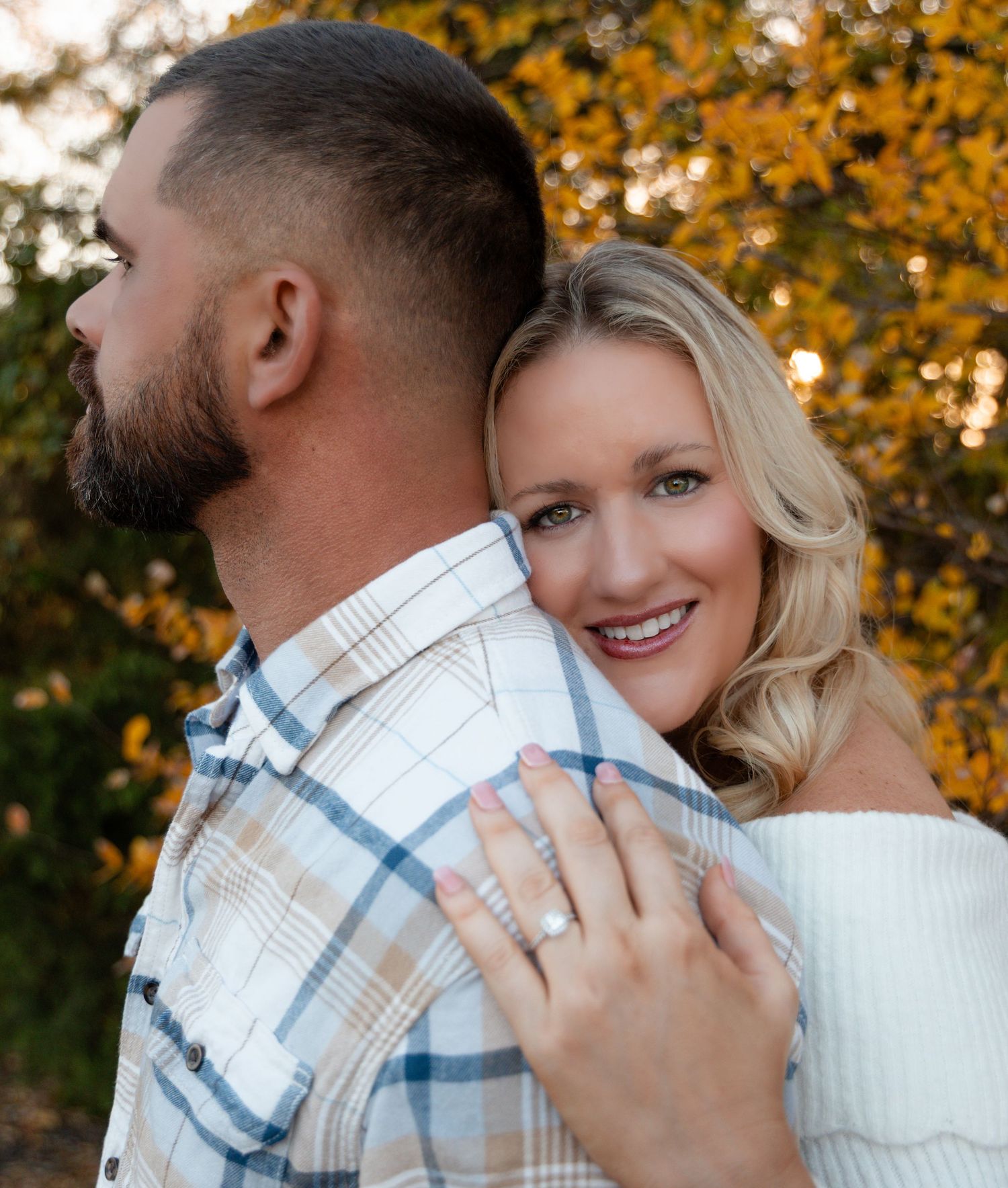 Couple posing during engagement session in McKinney Texas