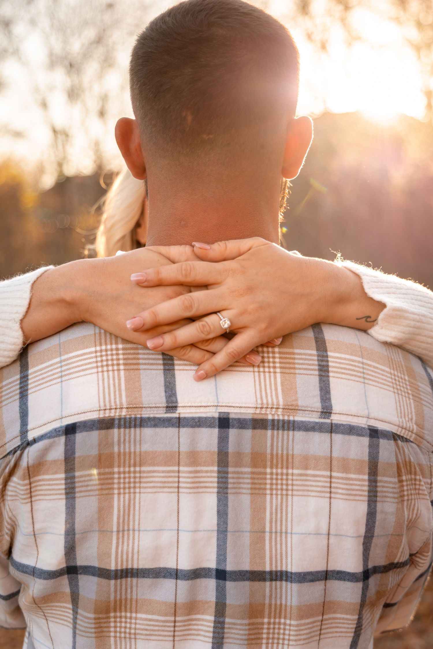 Couple posing during engagement session in McKinney Texas