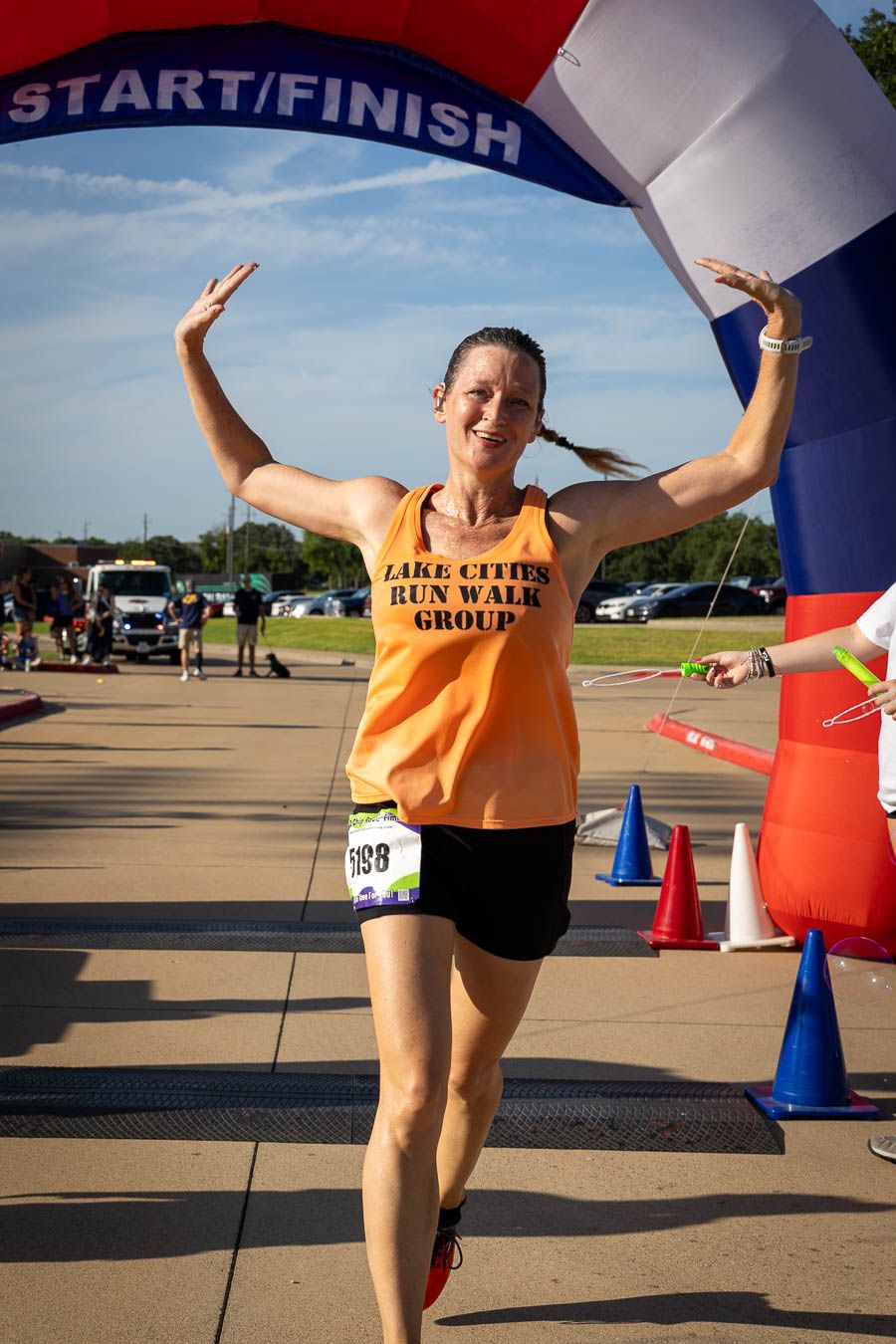 Athletes running during Corinth PD 5K race in Corinth Texas