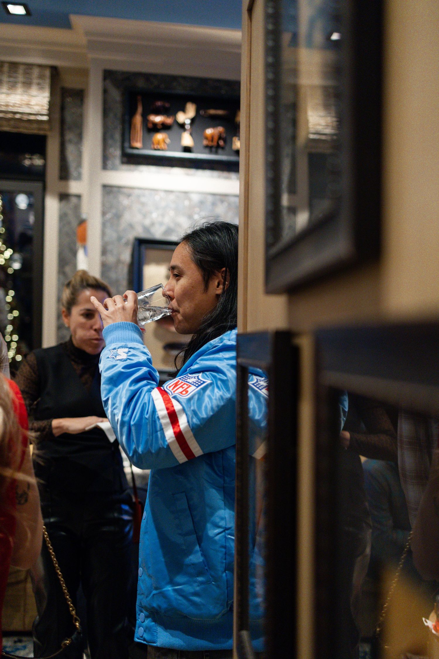 Guests socializing during holiday party event