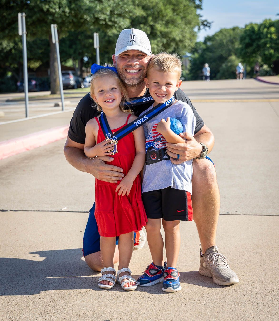 Family at finish line during Corinth PD 5K race in Corinth Texas