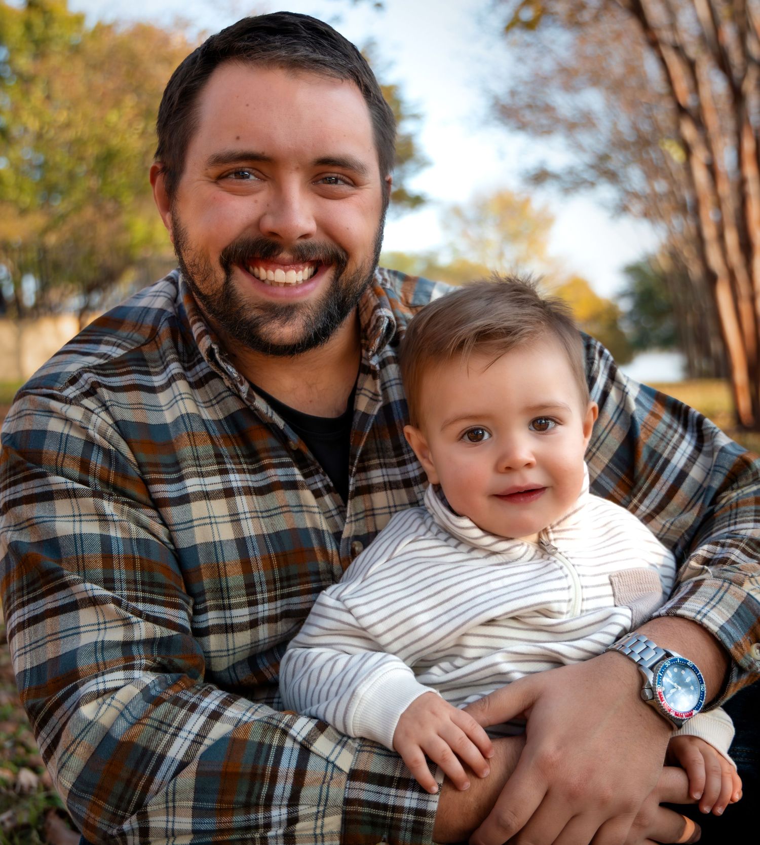 Father and son during outfoor fall session in dallas