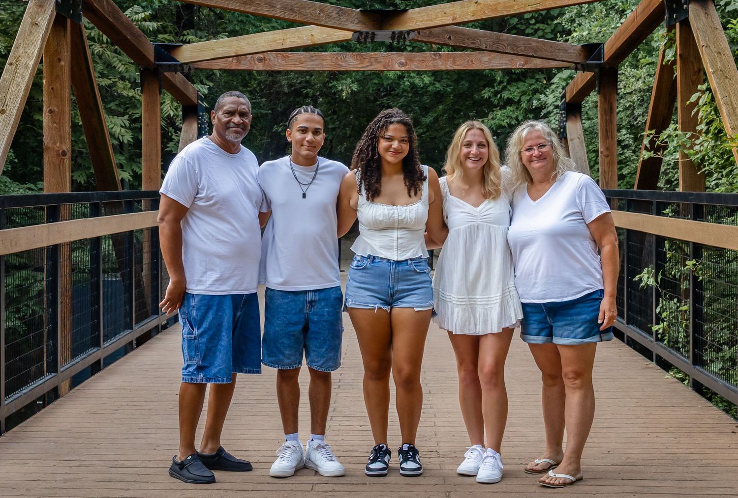Family posing for portrait photos in Richardson TX