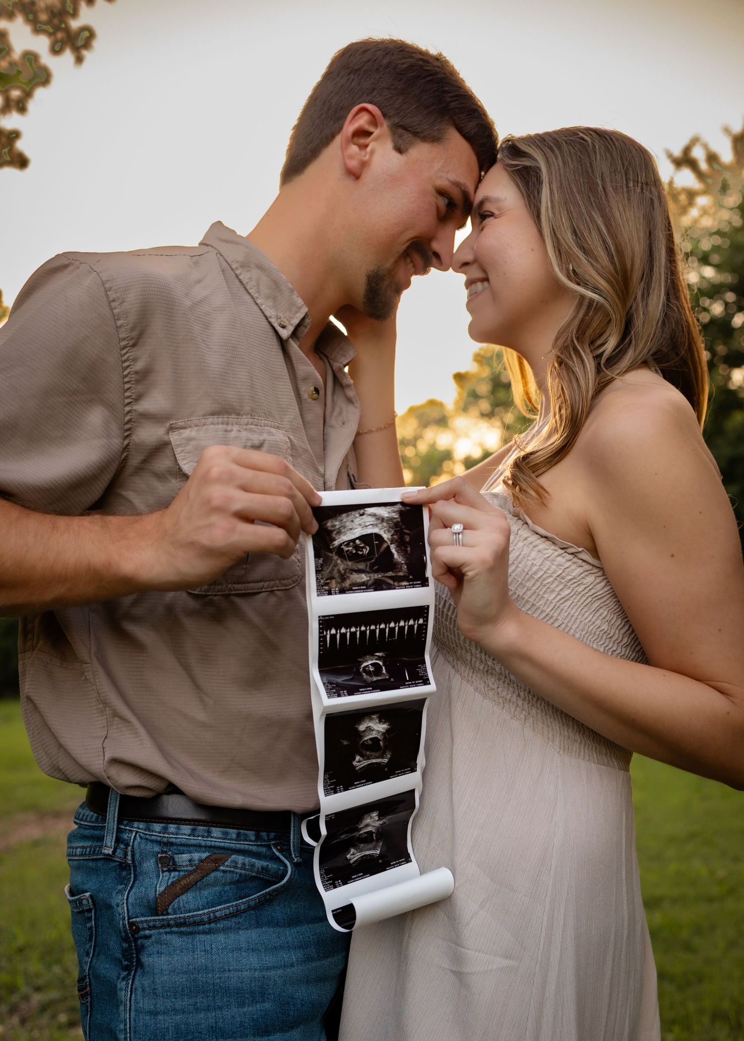 Expecting parents pregnancy announcement photos in McKinney Texas