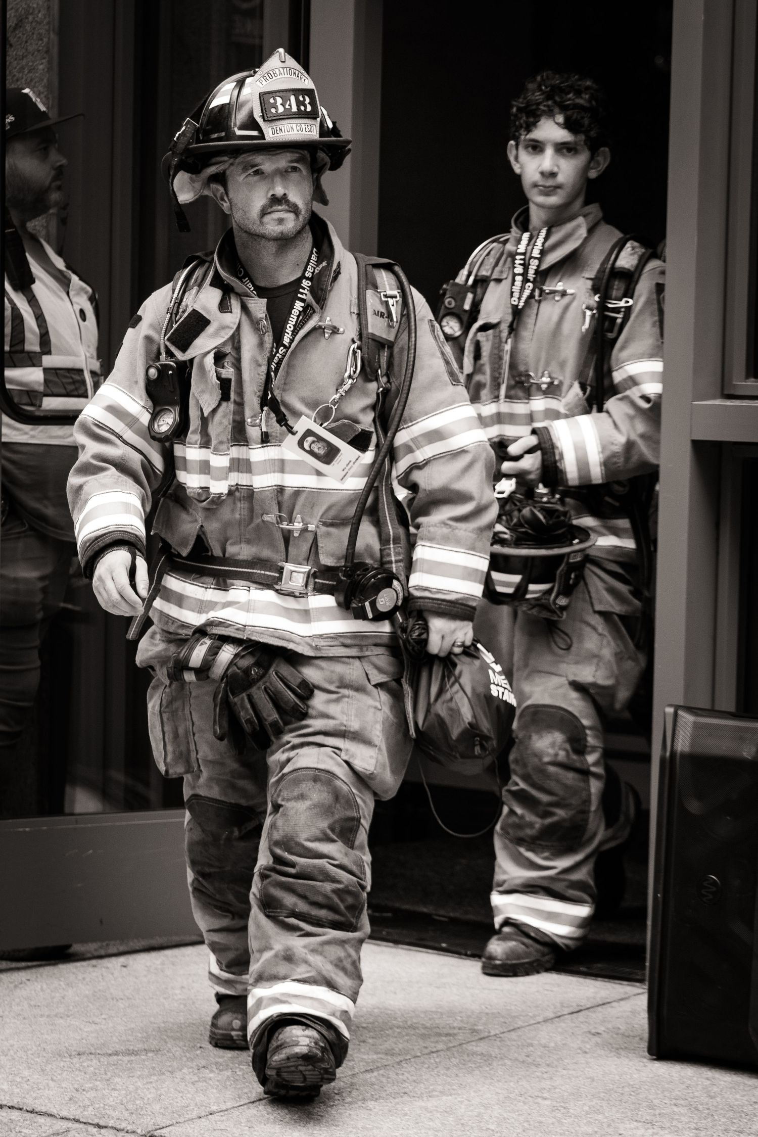 Firefighter exiting the building in DFW