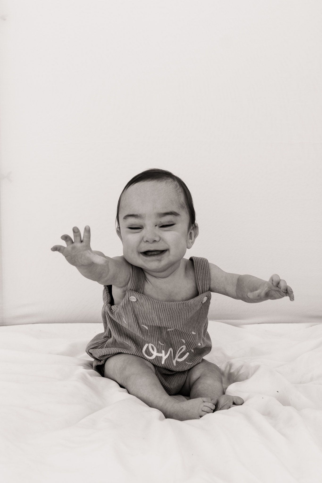One year milestone portrait of baby boy