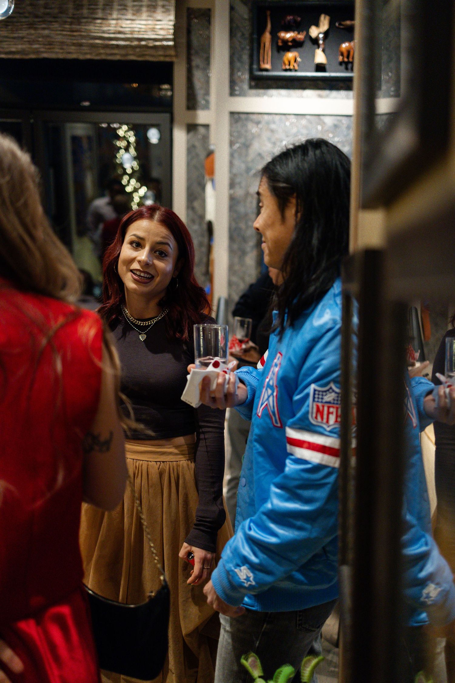 Guests socializing during holiday party event