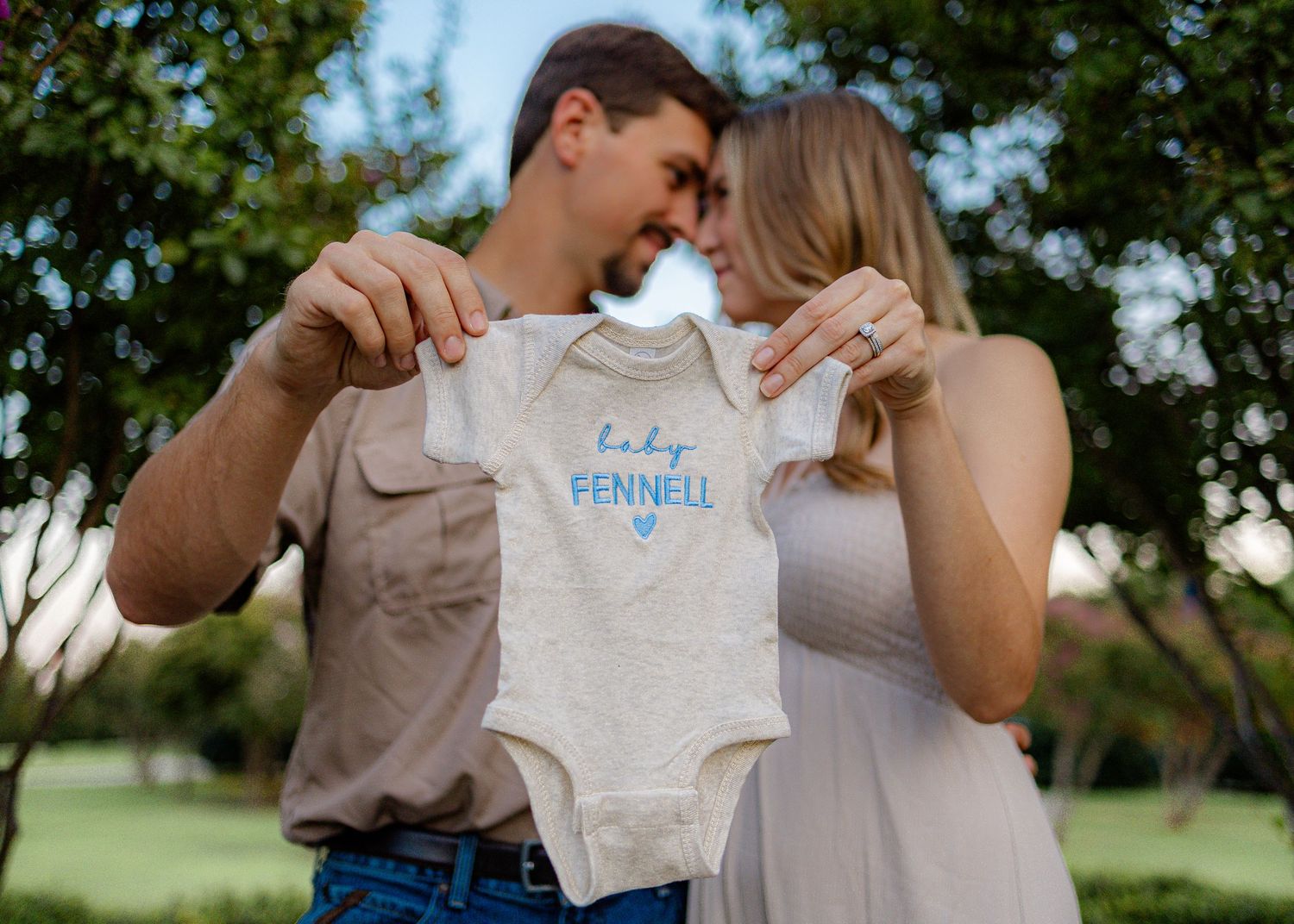 Expecting parents pregnancy announcement photos in McKinney Texas