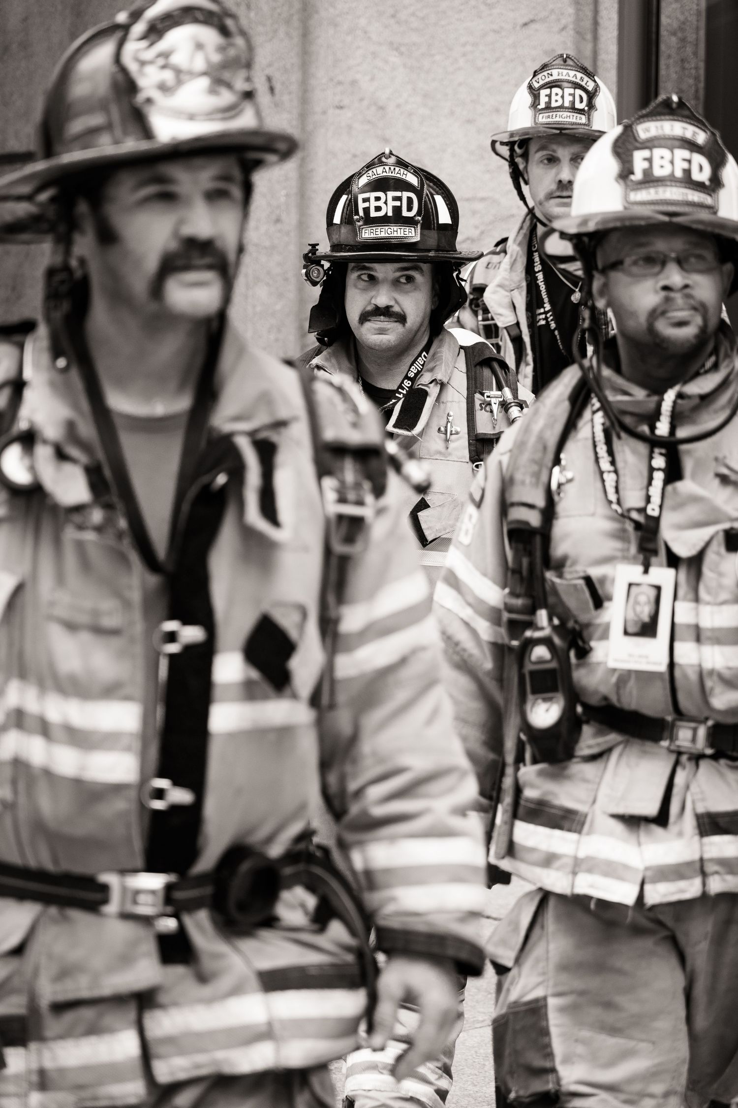 Firefighter group exiting the building in Dallas