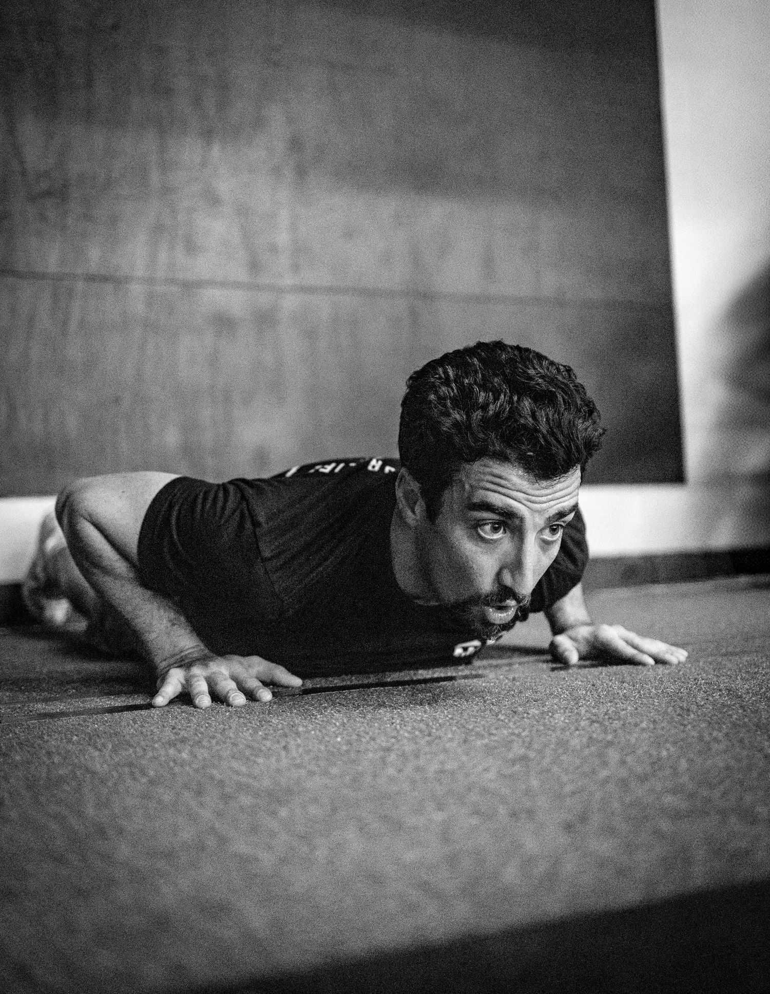 Crossfit Athlete doing wall walk in allen texas