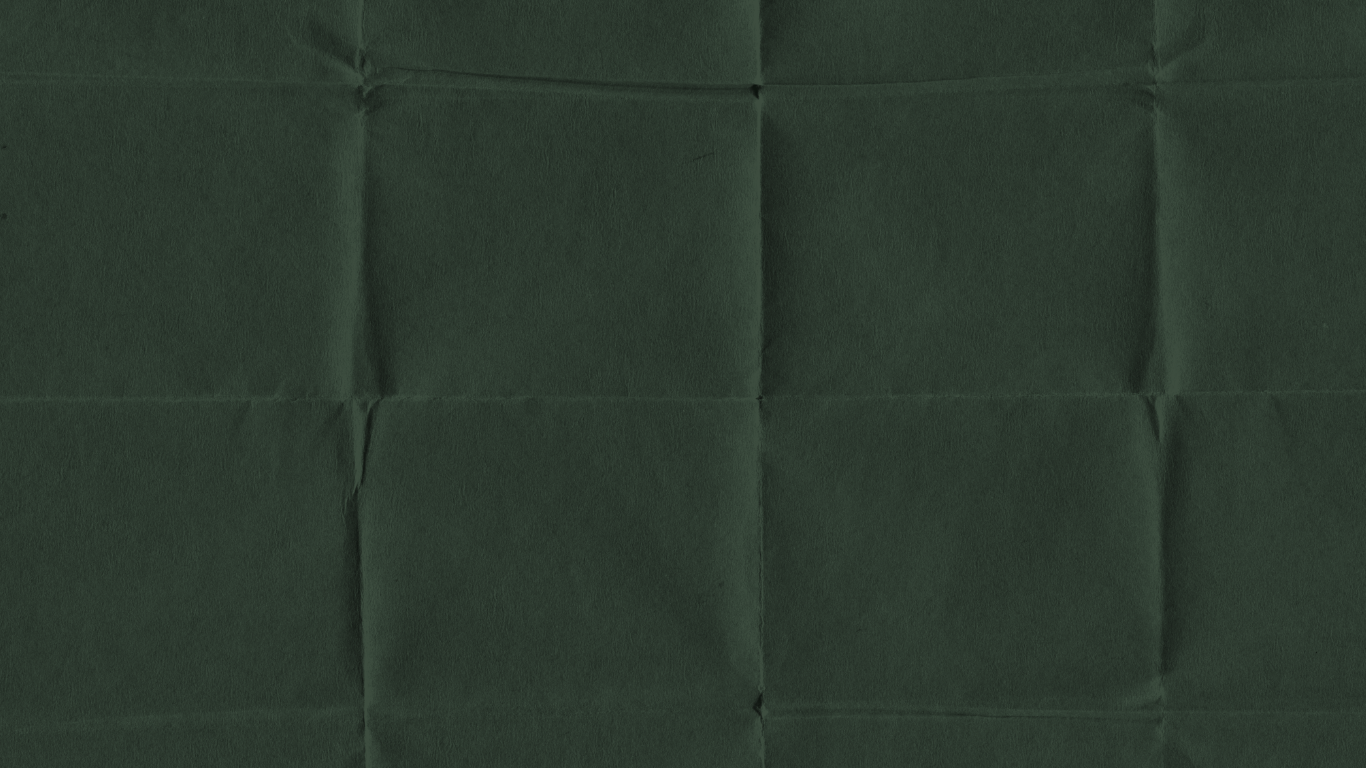 Dark green quilted fabric texture with a grid pattern of stitched squares, ideal for upholstery or padding backgrounds.