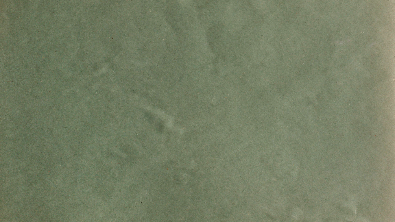 Close-up of smooth sage green stone surface with subtle texture and natural variations in color.