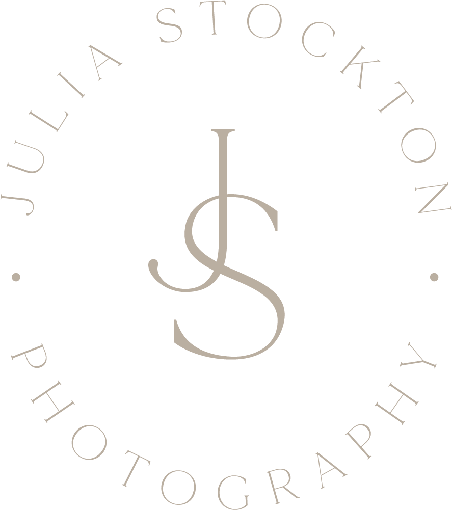Elegant circular logo for Julia Stockton Photography featuring intertwined JS monogram in soft beige tones.