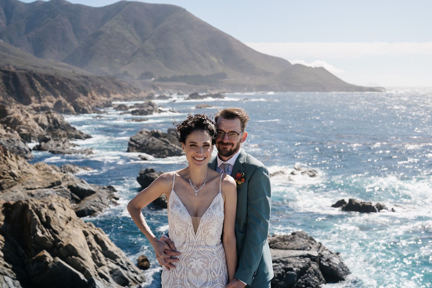 Couples posing for a portrait during their Big Sur Elopement.