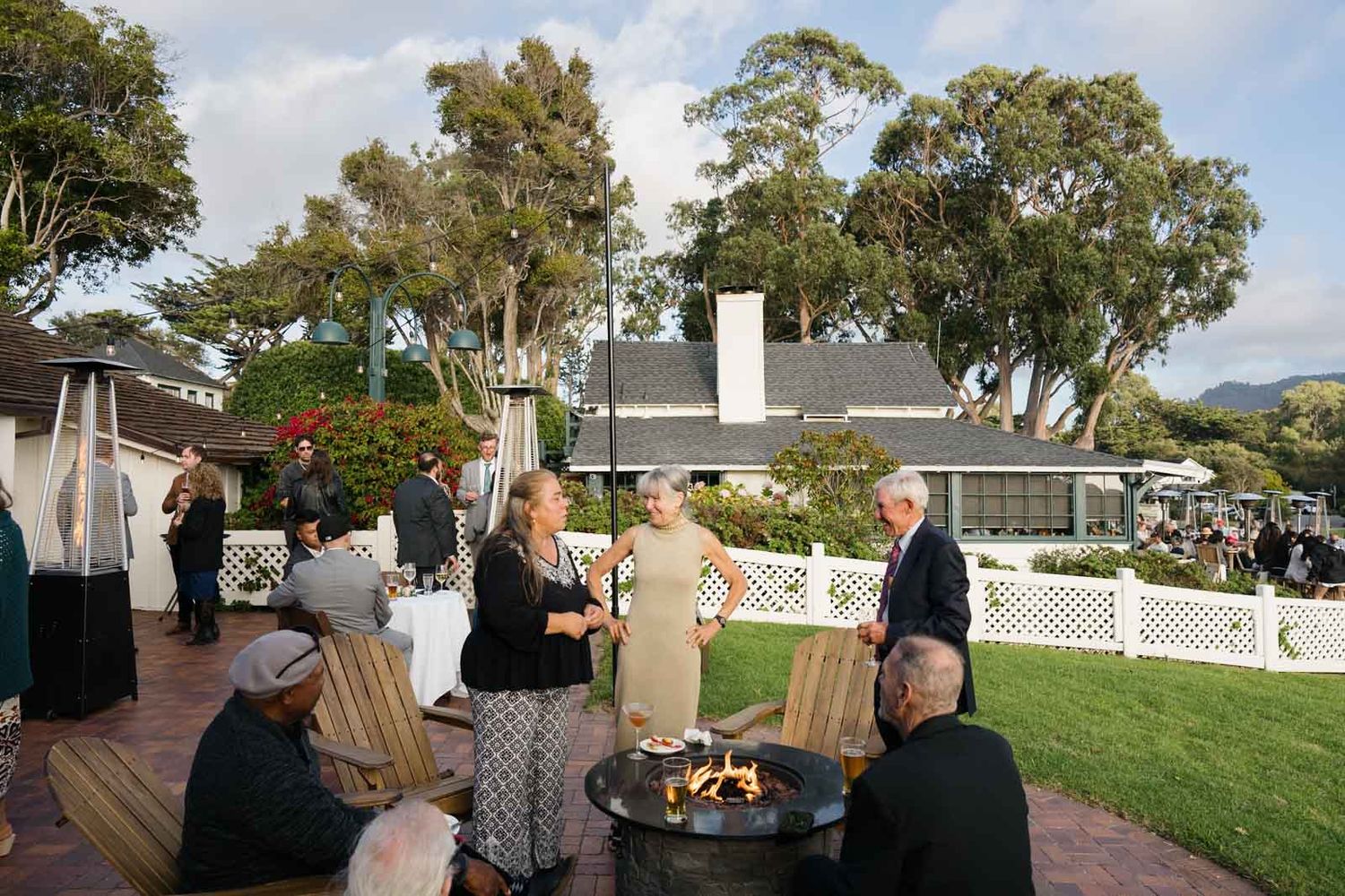 Wedding guests drinking cocktails at carmel's best wedding venue mission ranch.