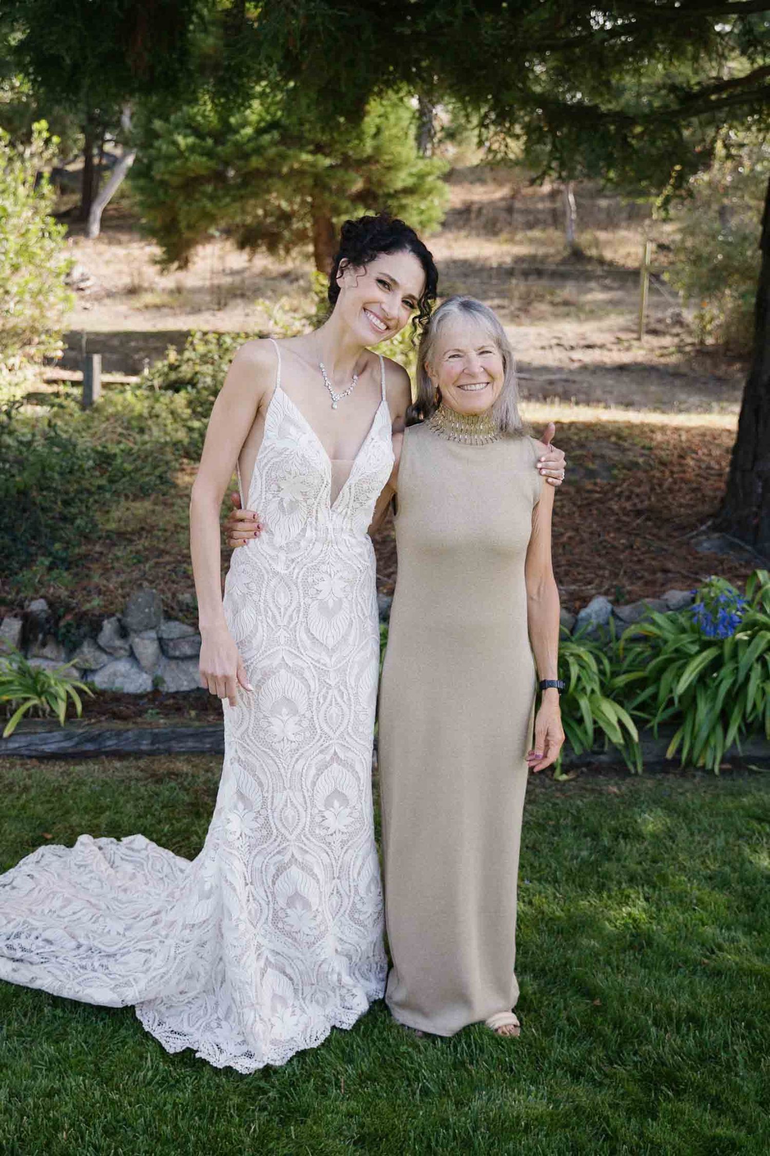 mother and bride getting their picture taken at their airbnb, acorn ranch, before the wedding ceremony.