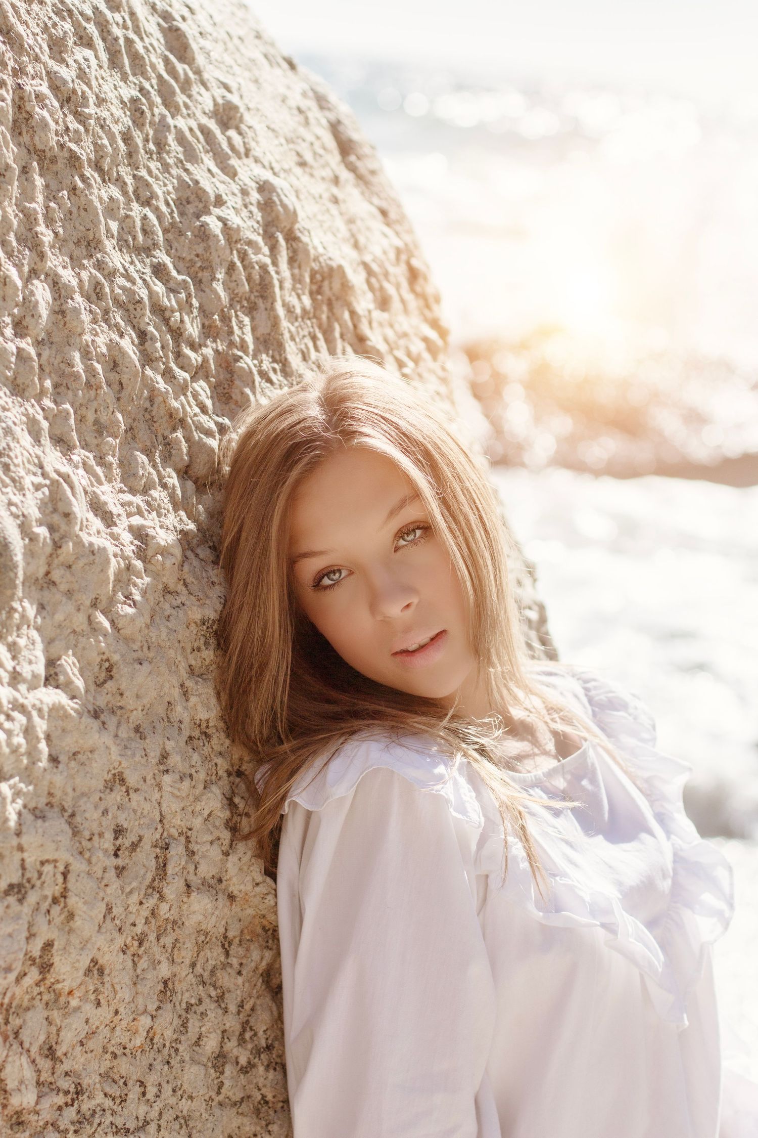 Candid portrait lifestyle photography session on Camps Bay beach at golden hour in Cape Town