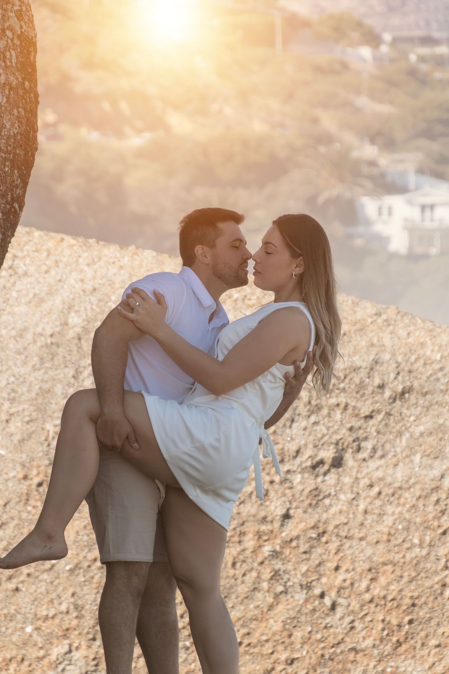 Editorial engagement photography session on Camps Bay beach at golden hour in Cape Town