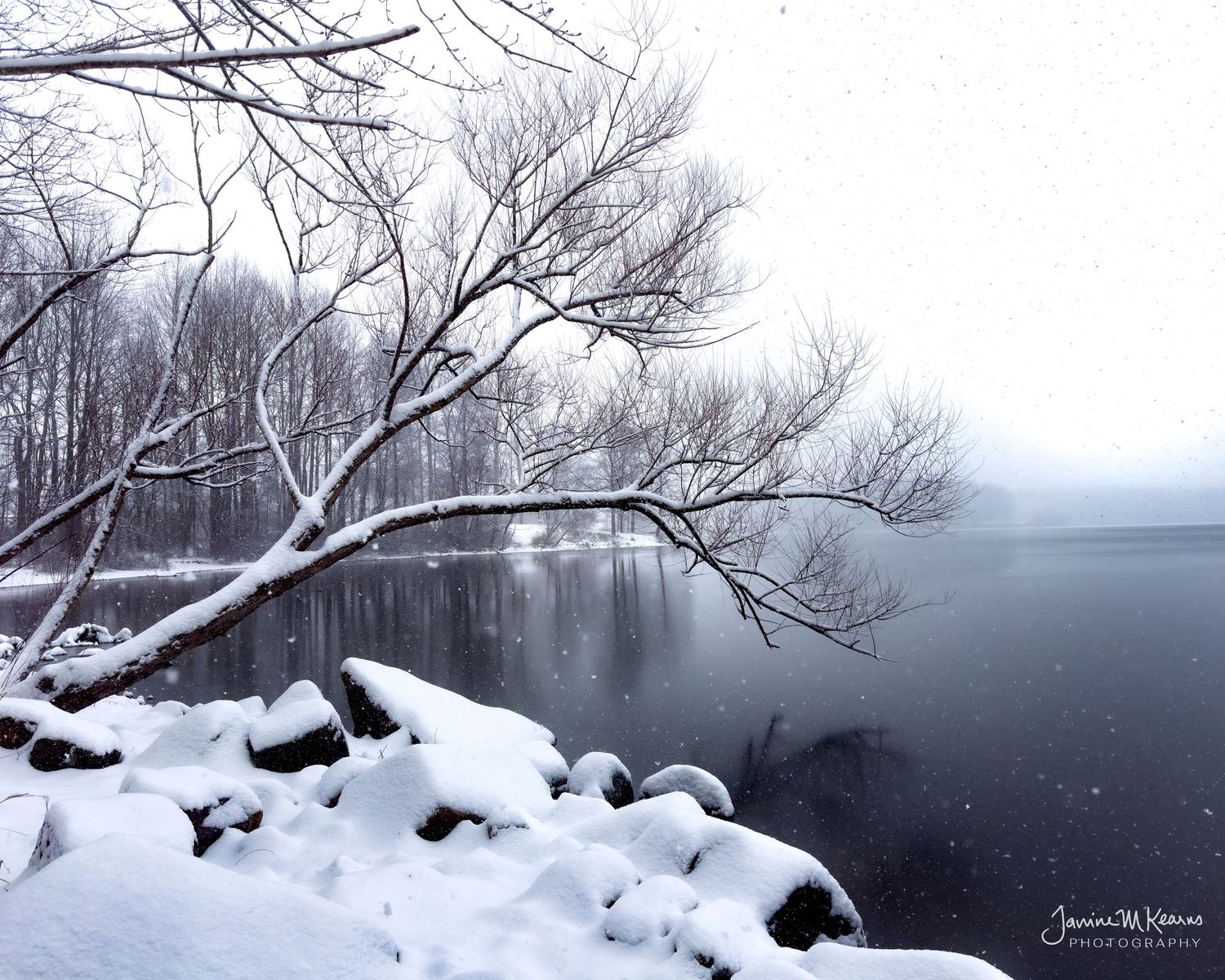 Chambers Lake covered in snow. Coatesville, Pennsylvania moody lake scene