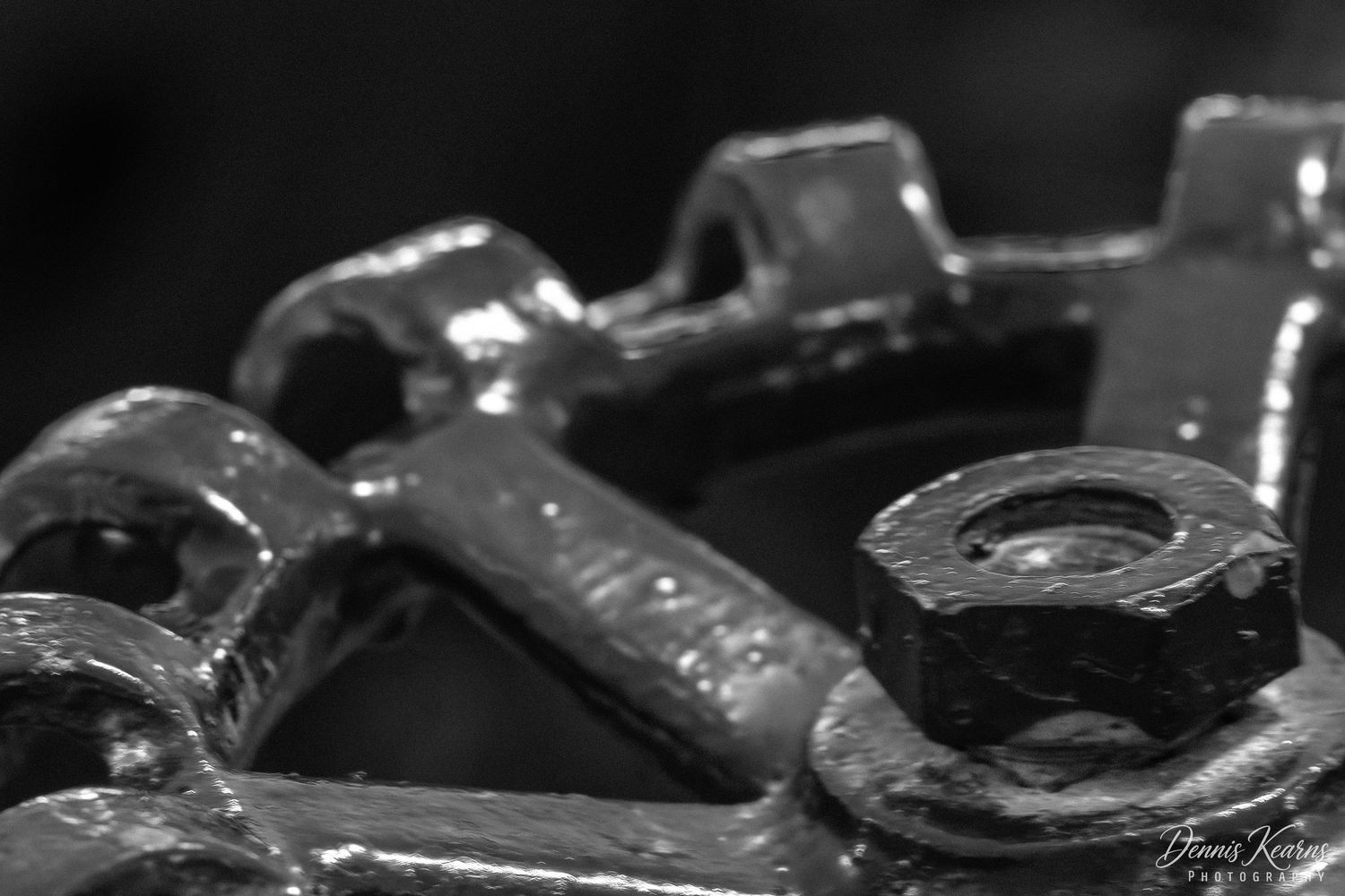 Black and white macro photo of Valve handle from Longwood Garden's Steam House.