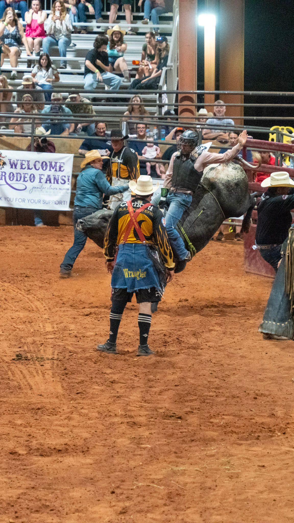 bull rider coming out of the shoot