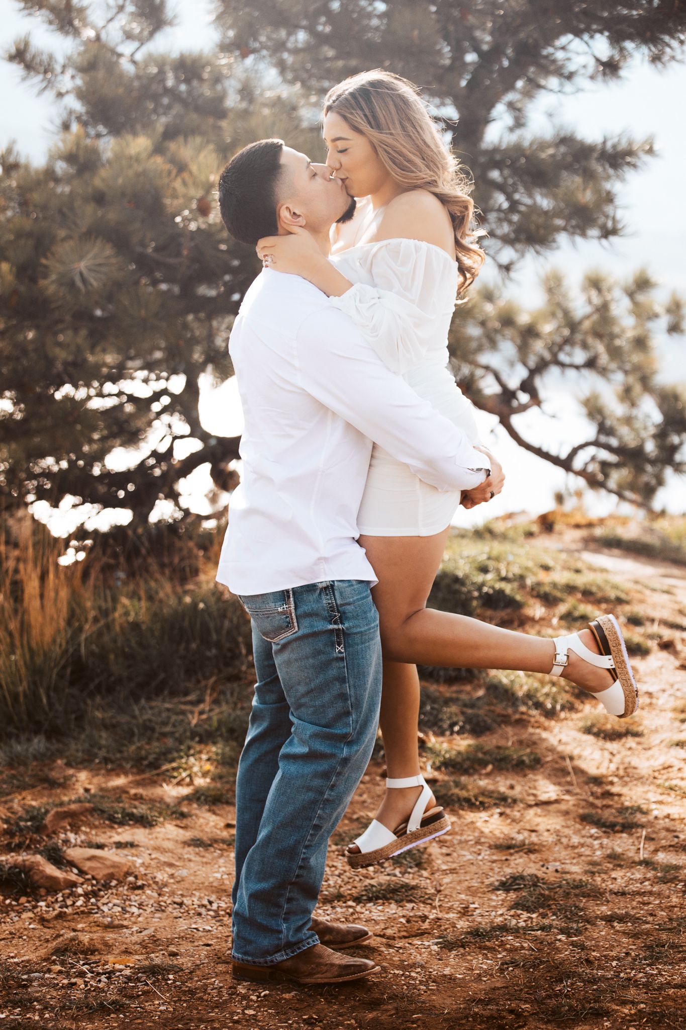 Colorado couples photoshoot photographed by Liz Rivas with moody studio lighting.