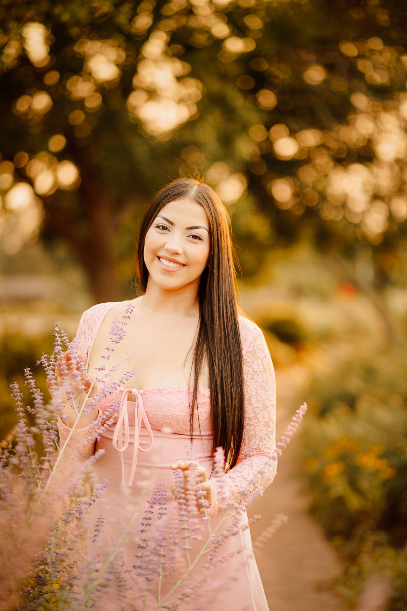 class of 2026 high school senior girl in Windsor Colorado posing for her senior pictures at golden hour in Greeley Colorado