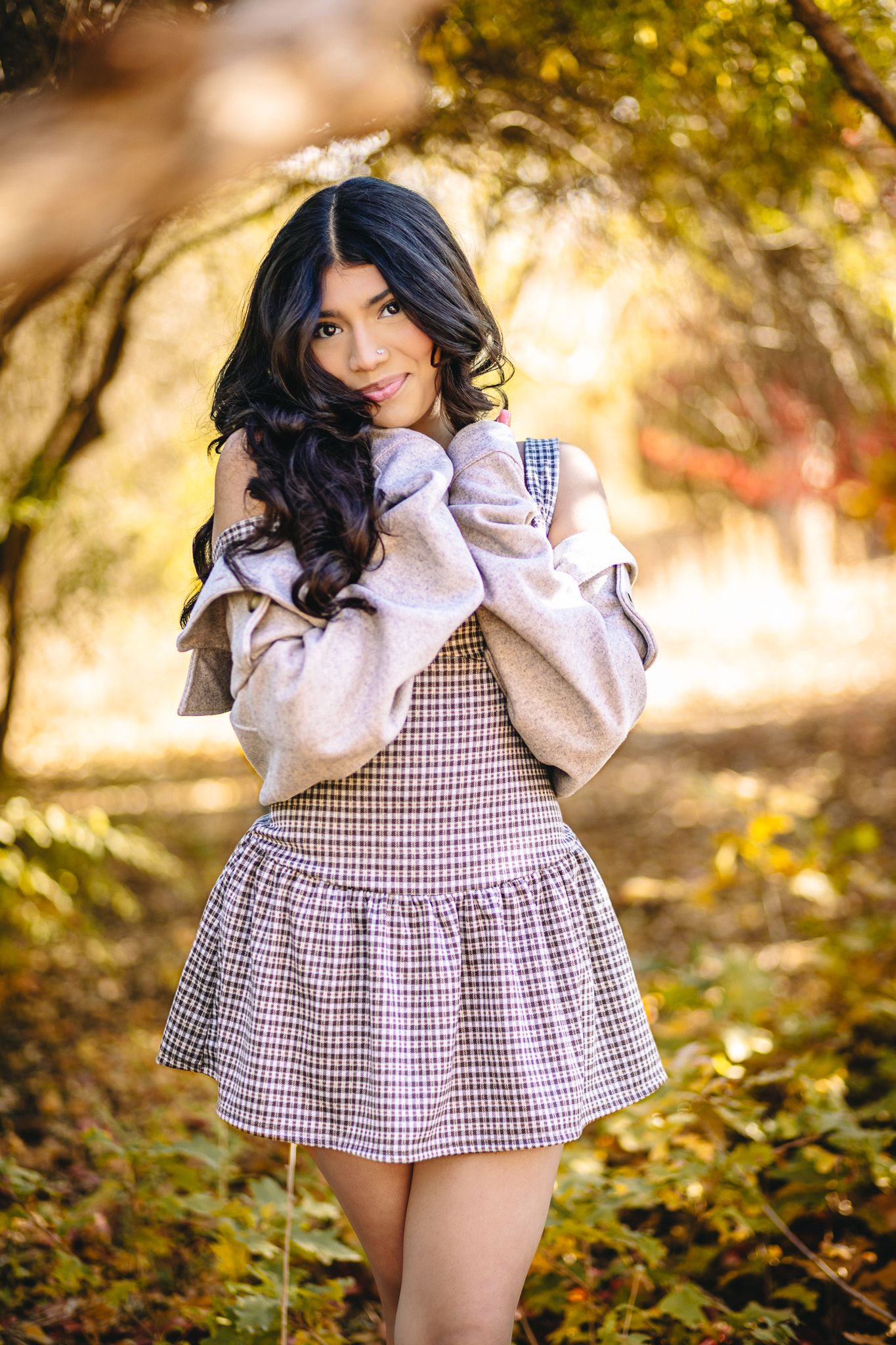 class of 2026 high school senior girl in Windsor Colorado posing for her senior pictures at golden hour in Greeley Colorado