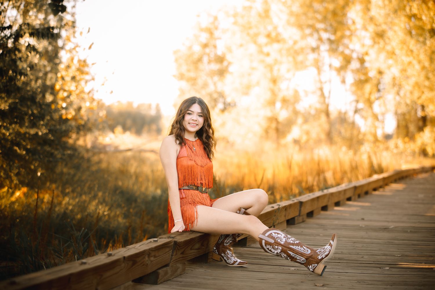 class of 2026 high school senior girl in Greeley Colorado posing for her senior pictures at golden hour in Greeley Colorado