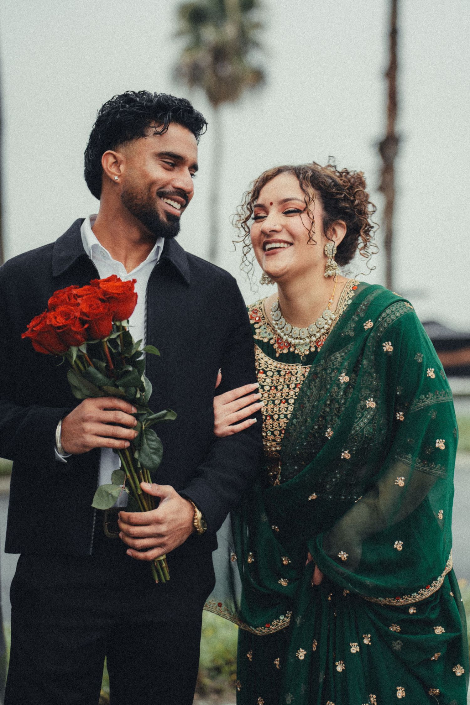 Elegant couple portrait celebrating special occasion during holiday season photographed by Ionframe Studio