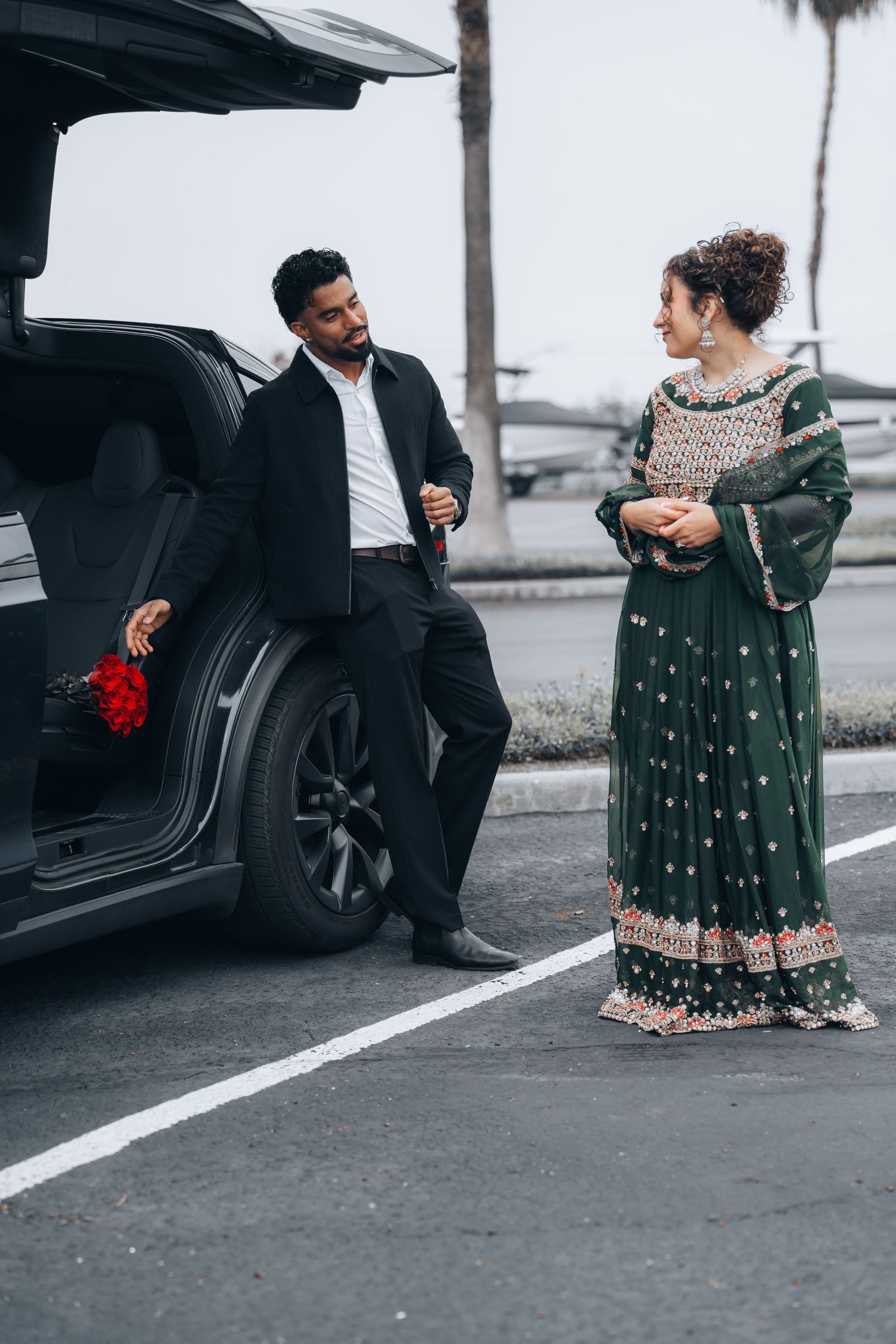 Candid lifestyle photo of couple arriving at event venue by car captured by Ionframe Studio