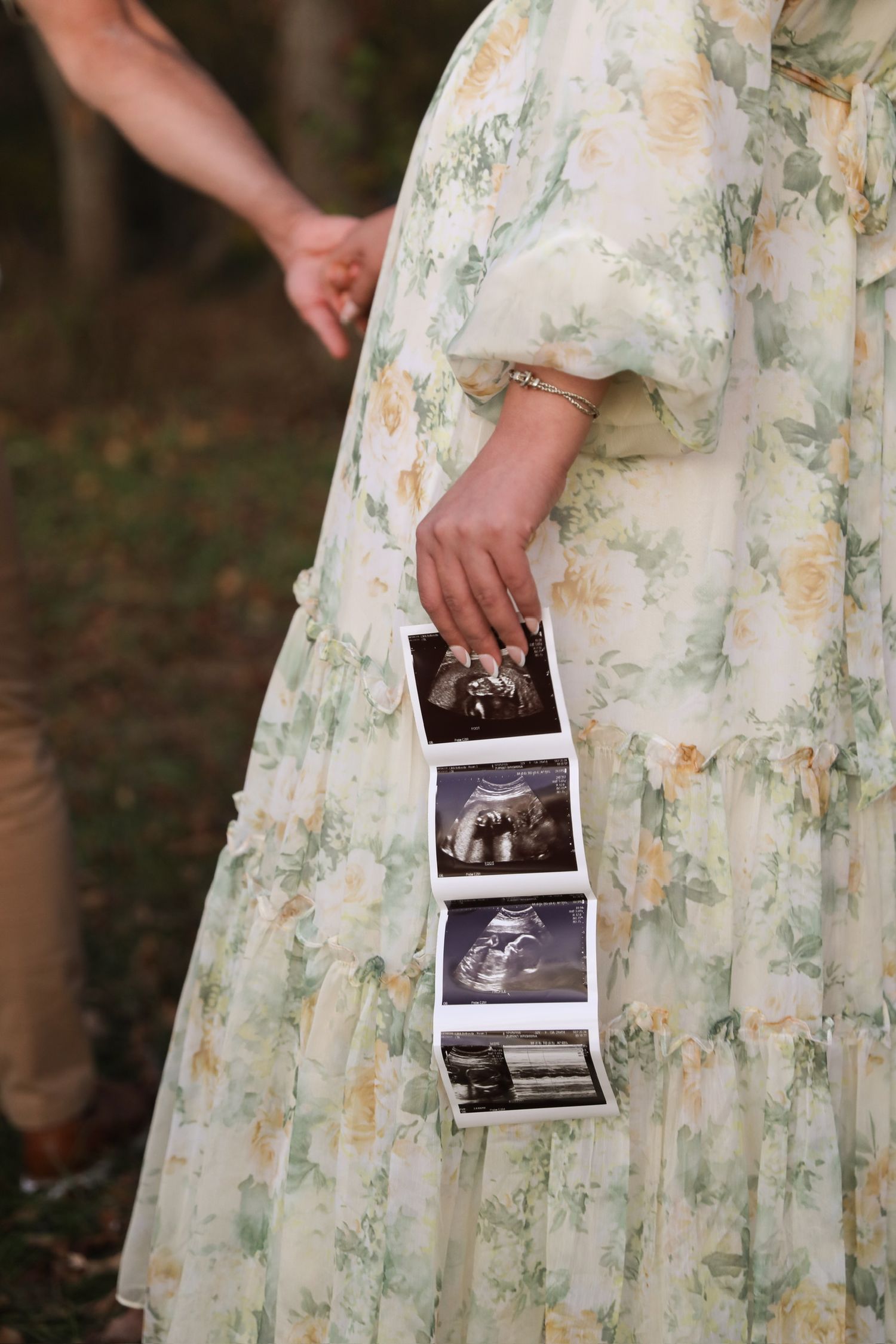 A person in a floral dress holds ultrasound photos in a series of connected images showing a pregnancy announcement.