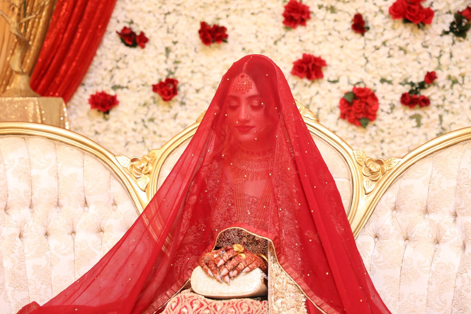 A red bridal veil flows across multiple frames in a romantic wedding photo sequence.