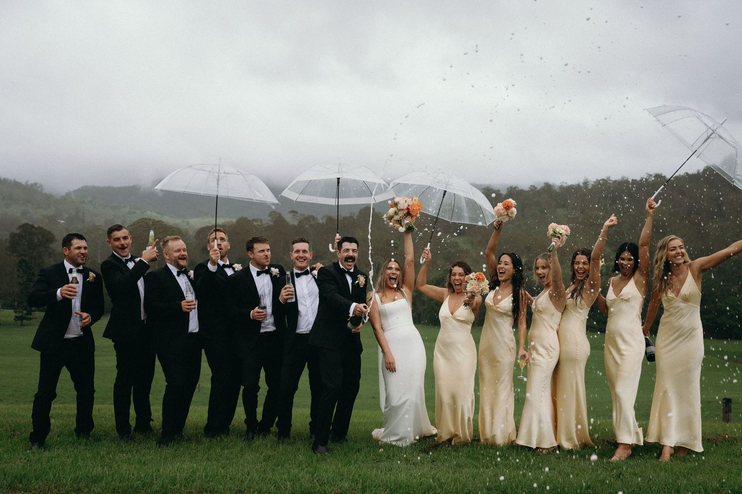 bridal party photo in the rain by Darwin wedding photographer – Weddings by Shiv