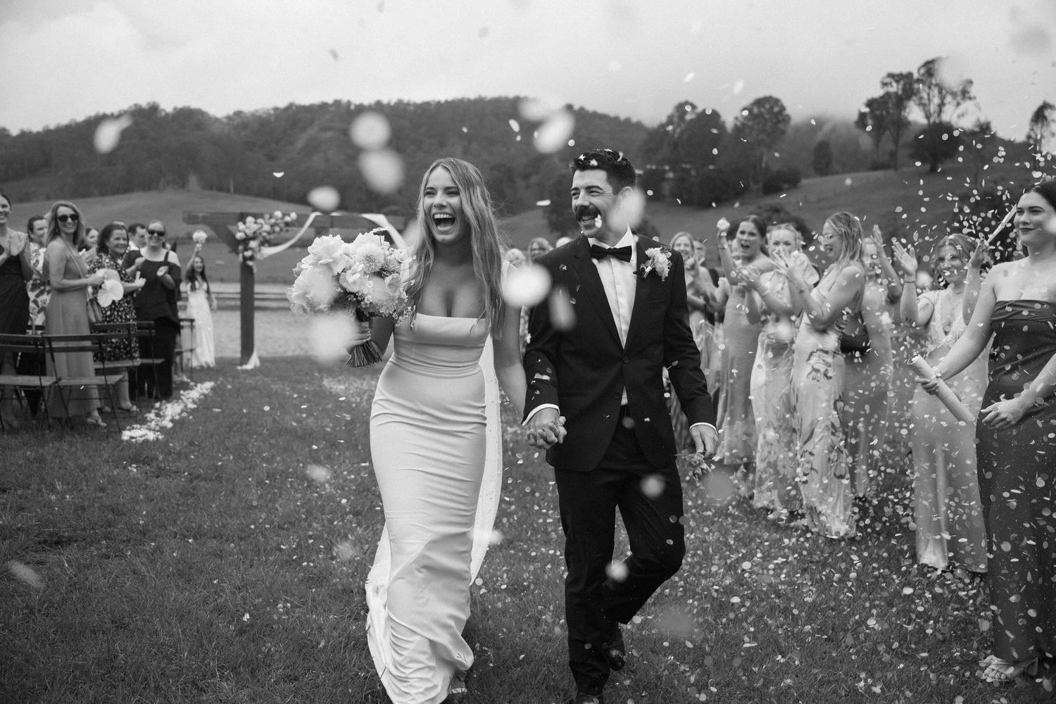 bride and groom leaving ceremony by Darwin wedding photographer – Weddings by Shiv