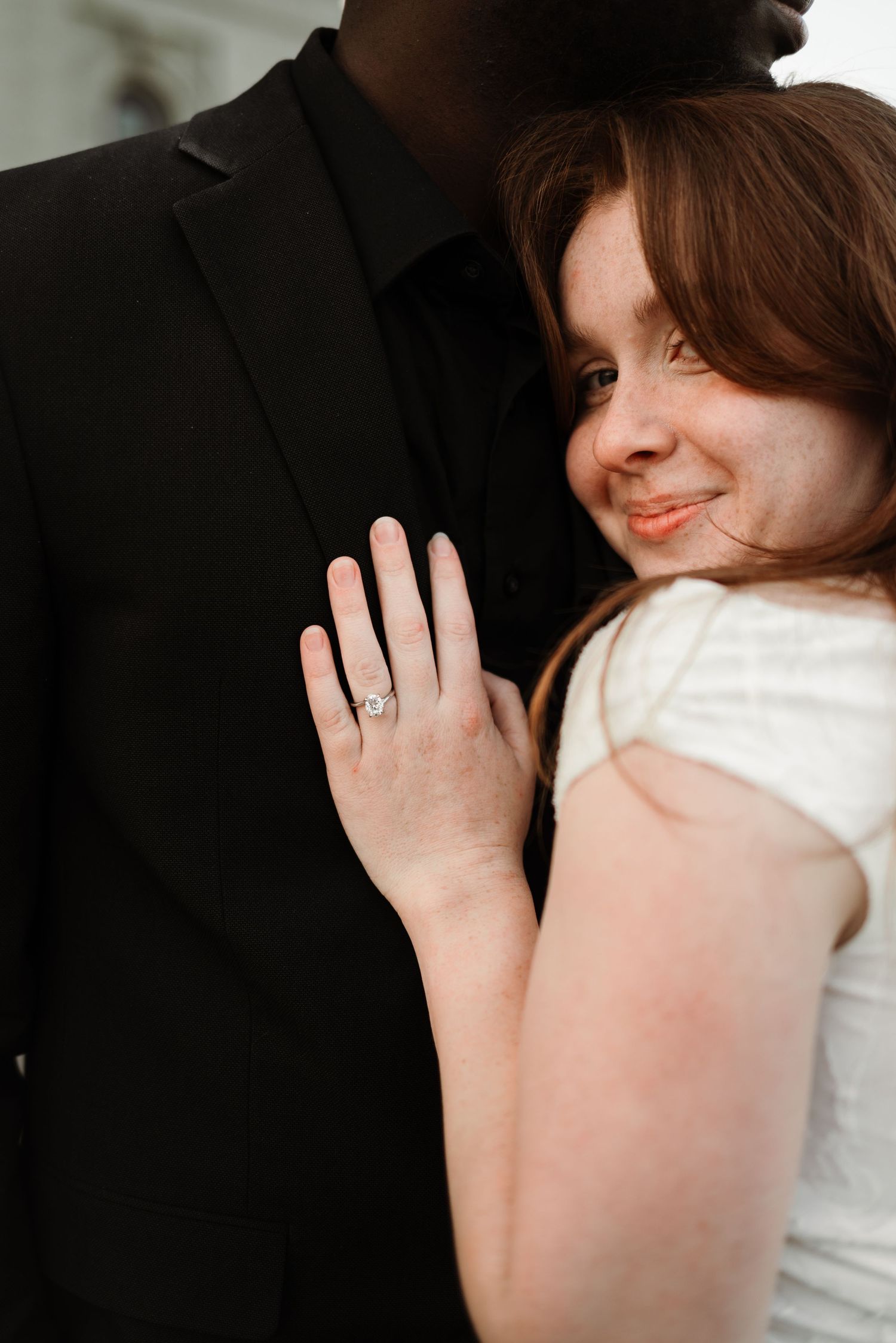 Close-up shots of a couple's hands showing off a wedding ring in an intimate moment.