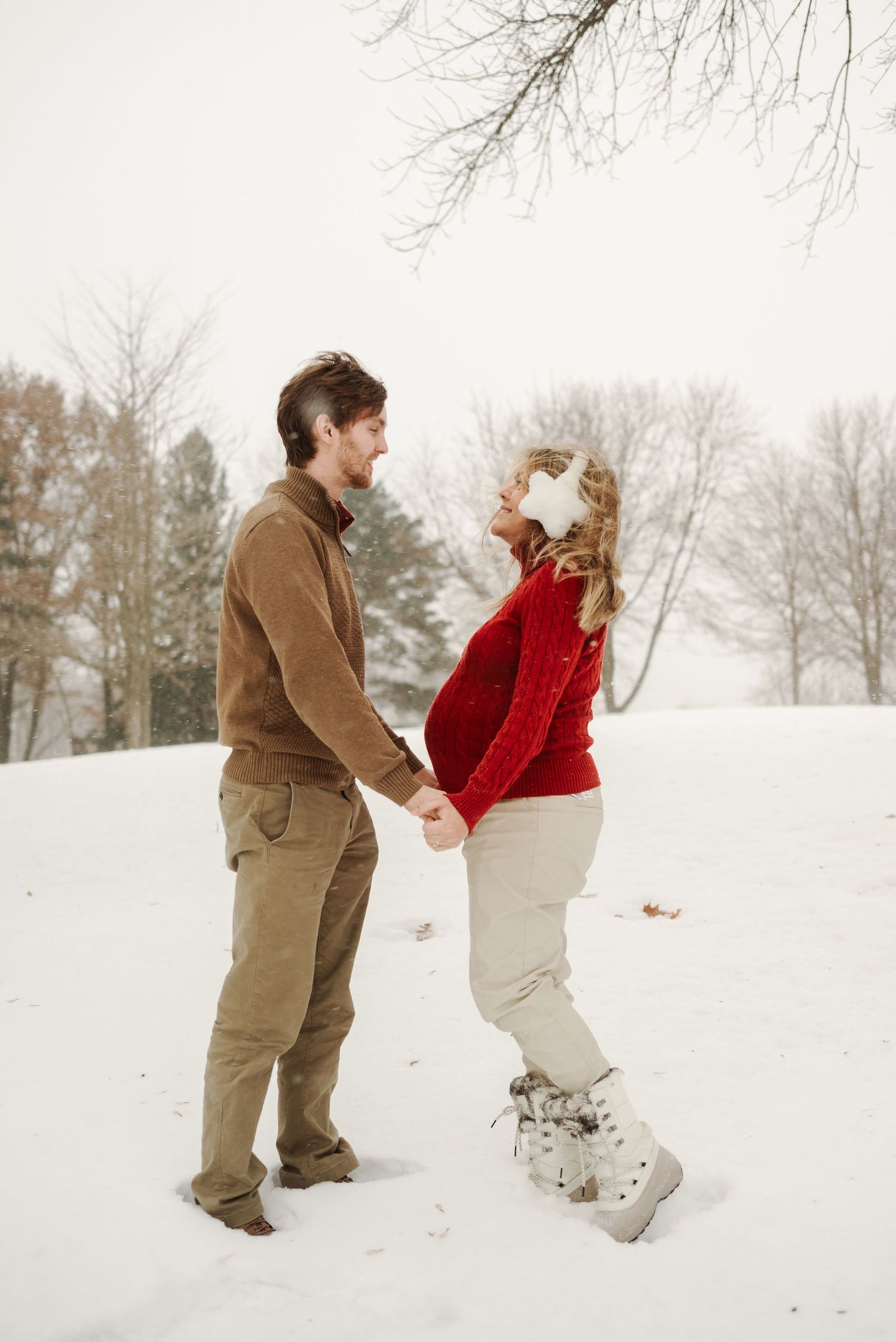 woman and man holding hands in Minnesota winter