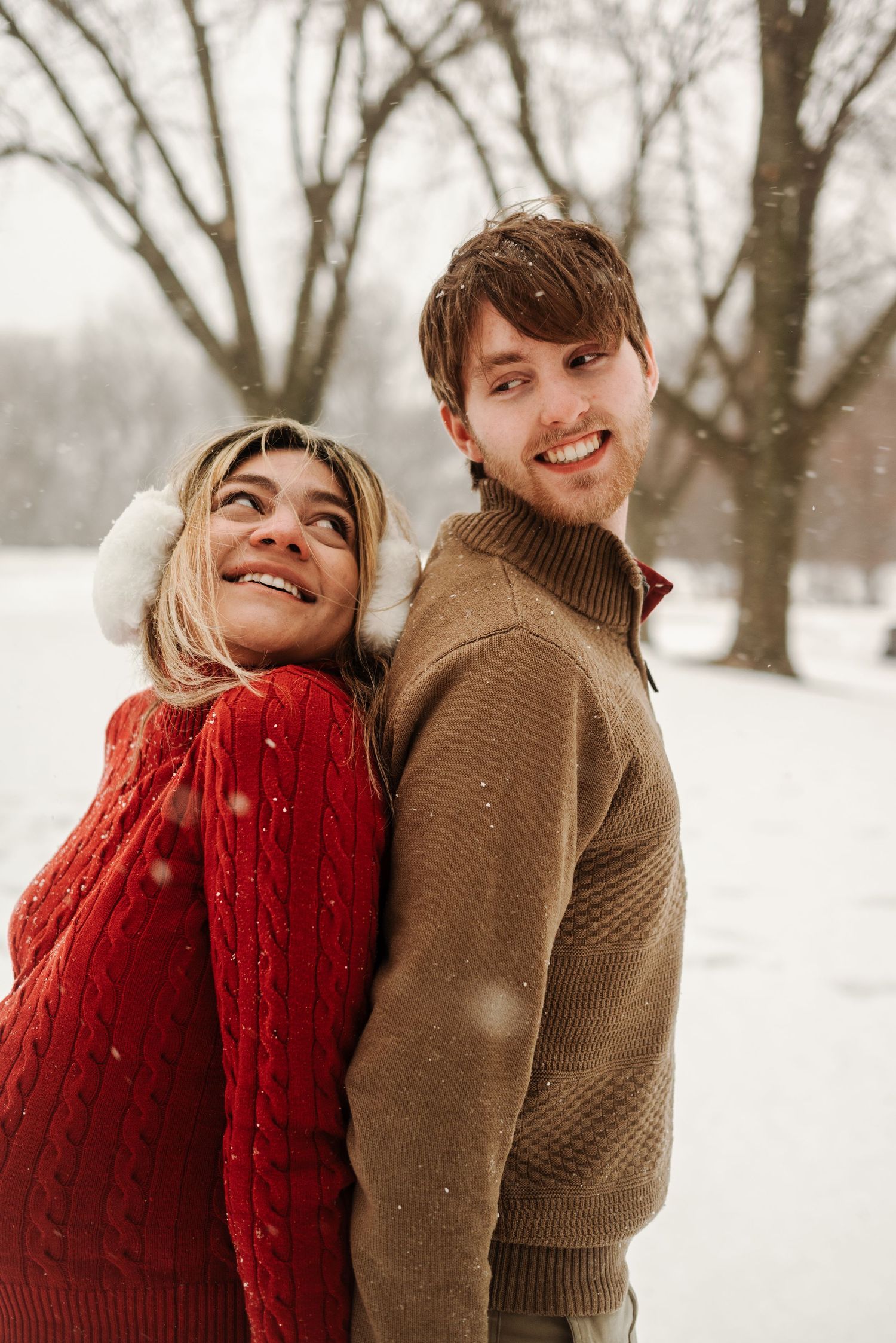 woman and man holding hands in Minnesota winter