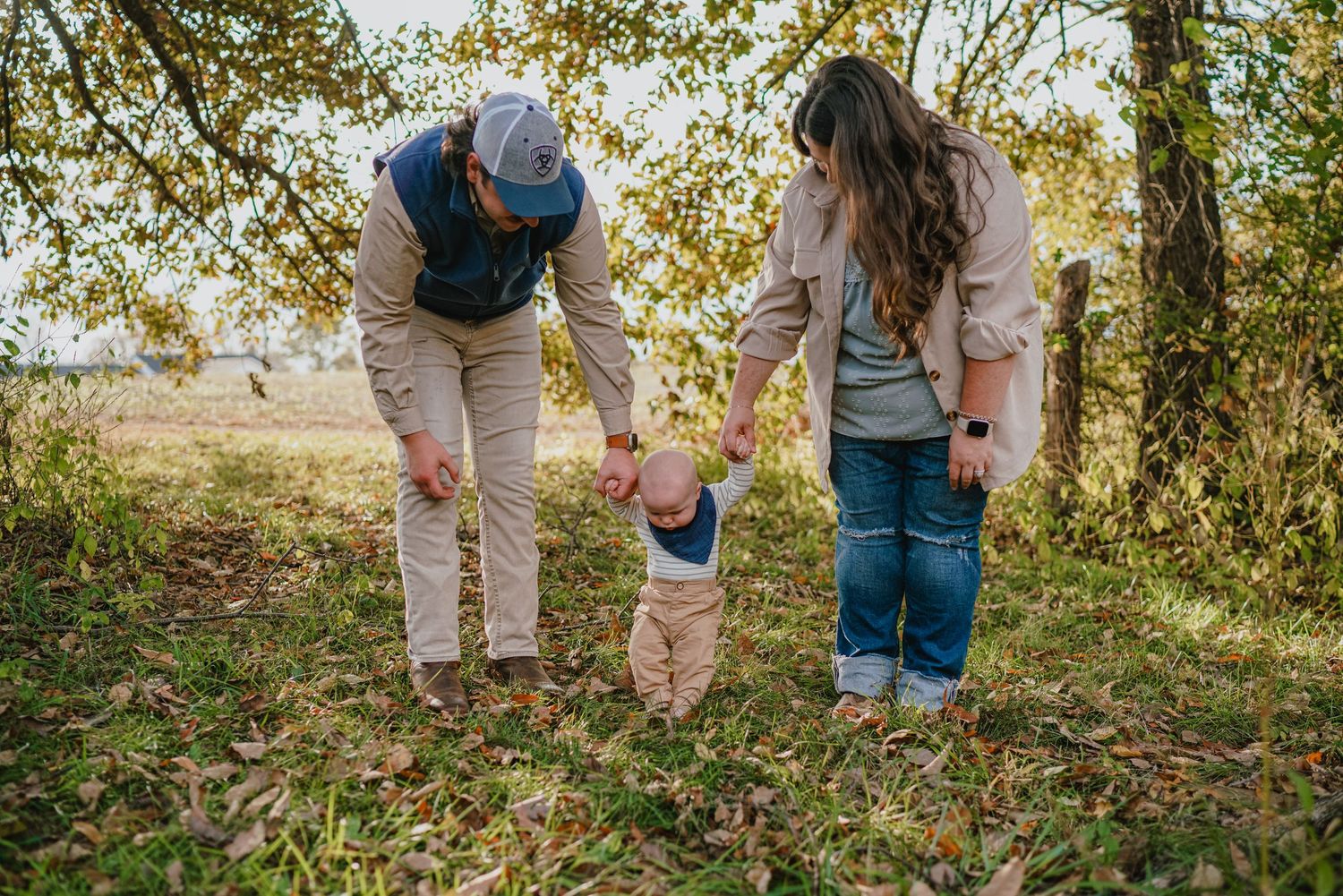 Candid family moments captured in a natural outdoor setting.