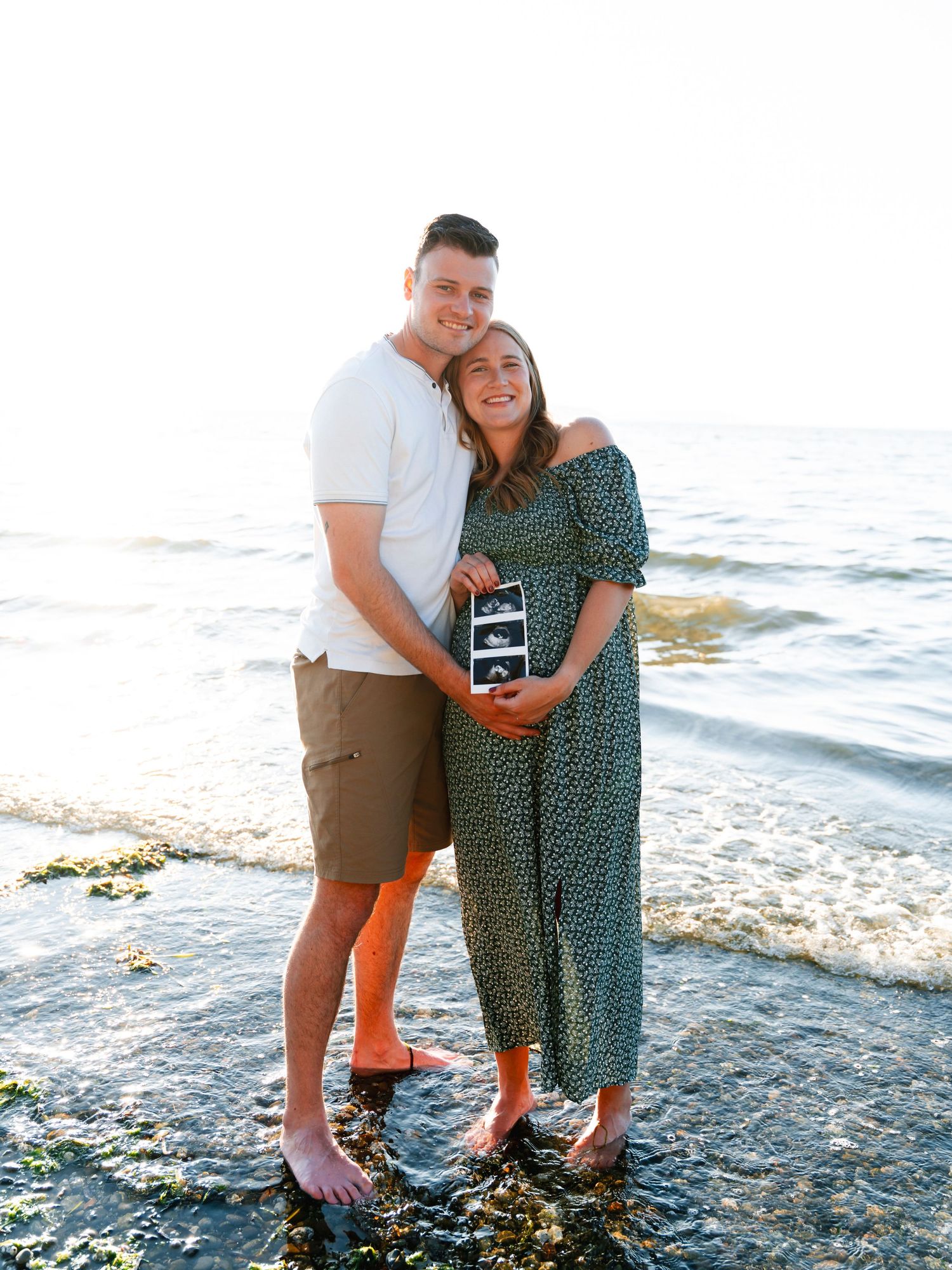 Maternity photo, couple portrait near water