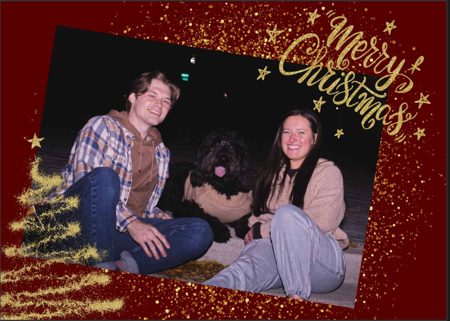 A couple and their large black dog pose together for a festive Merry Christmas holiday photo card.