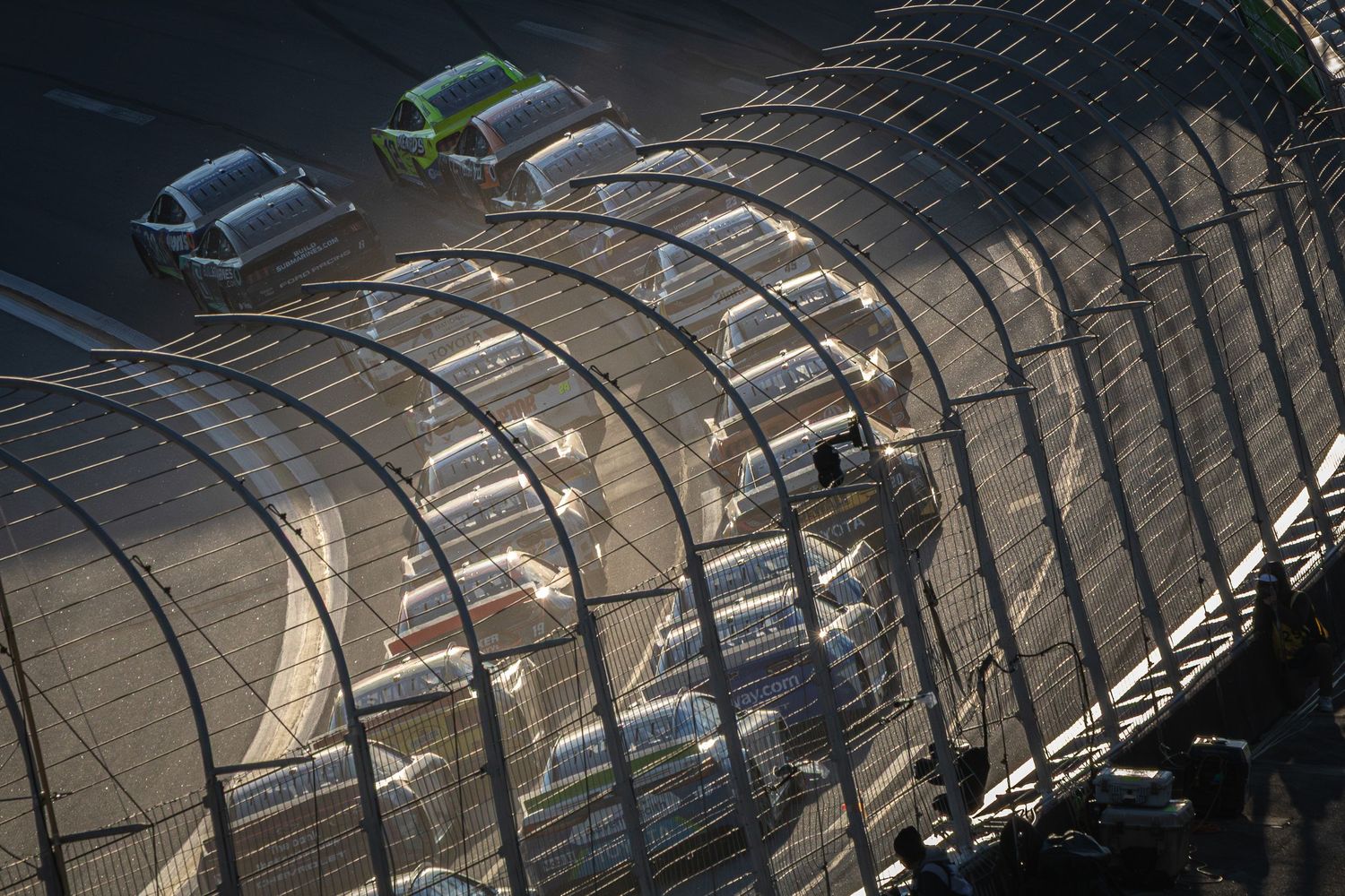 Aerial view of NASCAR race cars lined up on banked turn during the AutoTrader 400 on February 22nd 2026 at EchoPark Speedway