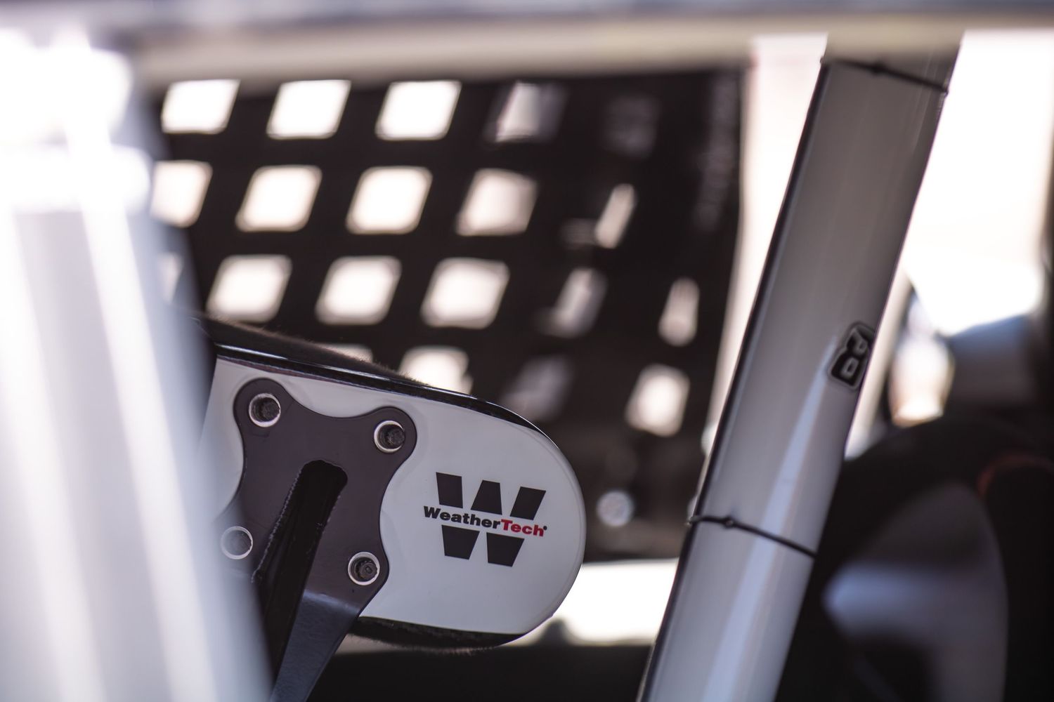 Close-up detail of NASCAR racing equipment and infrastructure at a professional racing facility.