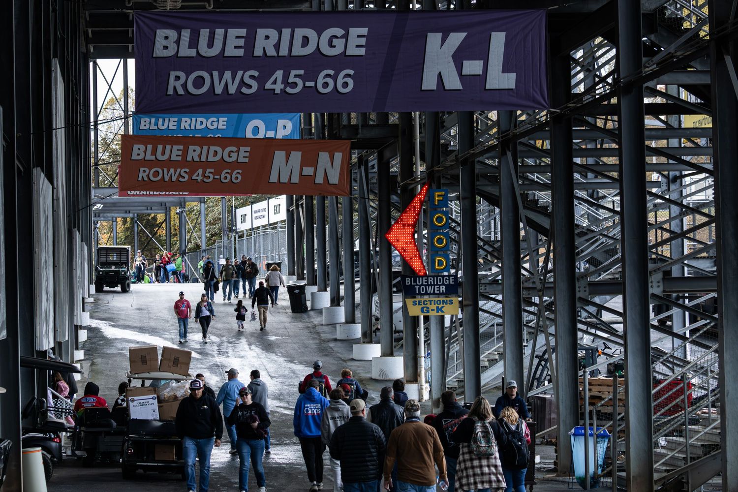 Interior concourse of Blue Ridge stadium showing directional signs and walkways.