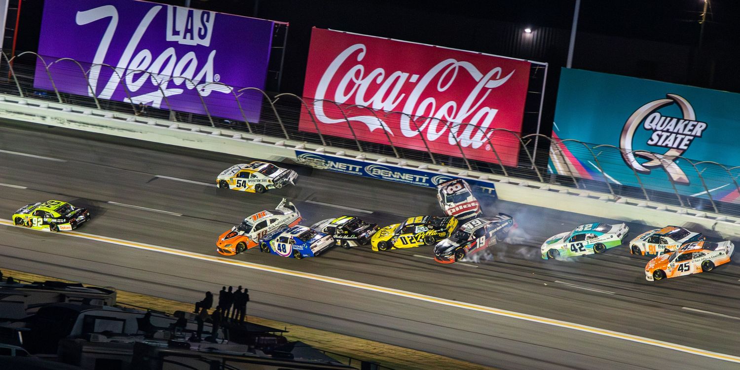 Night racing action under bright lights during the Bennet Transportation & Logistics 250 on February 21st 2026
