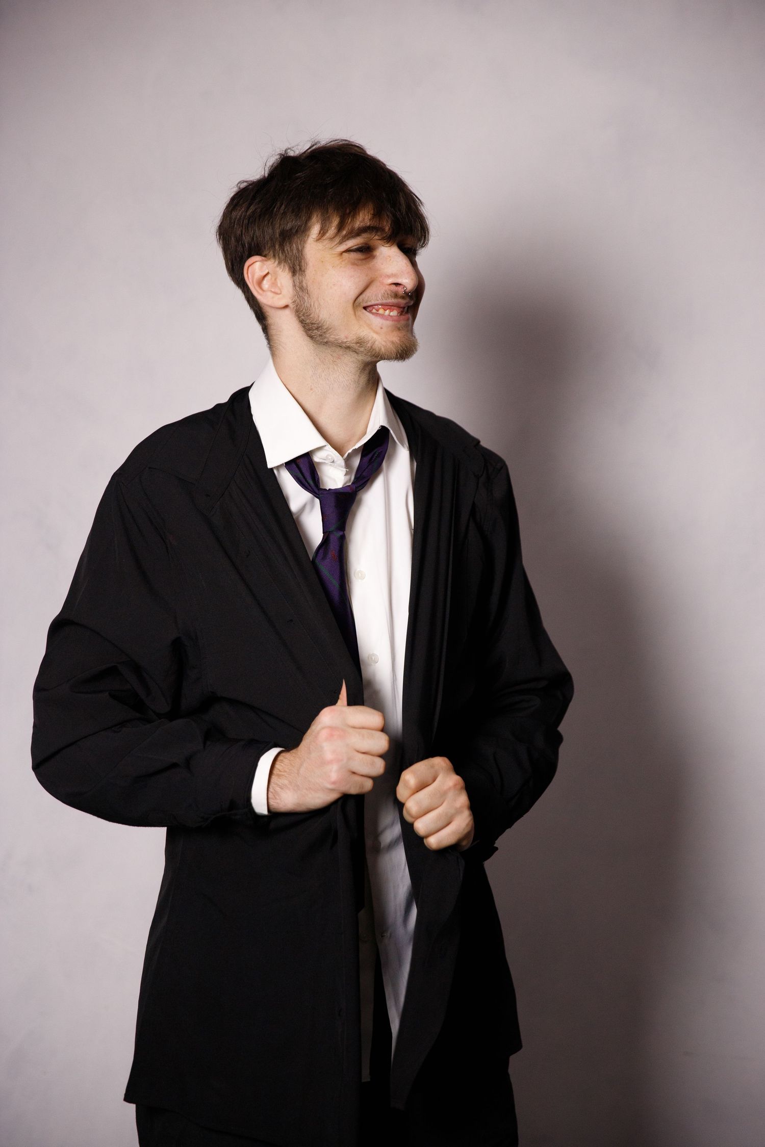 Professional portrait series showing movement in formal business attire.