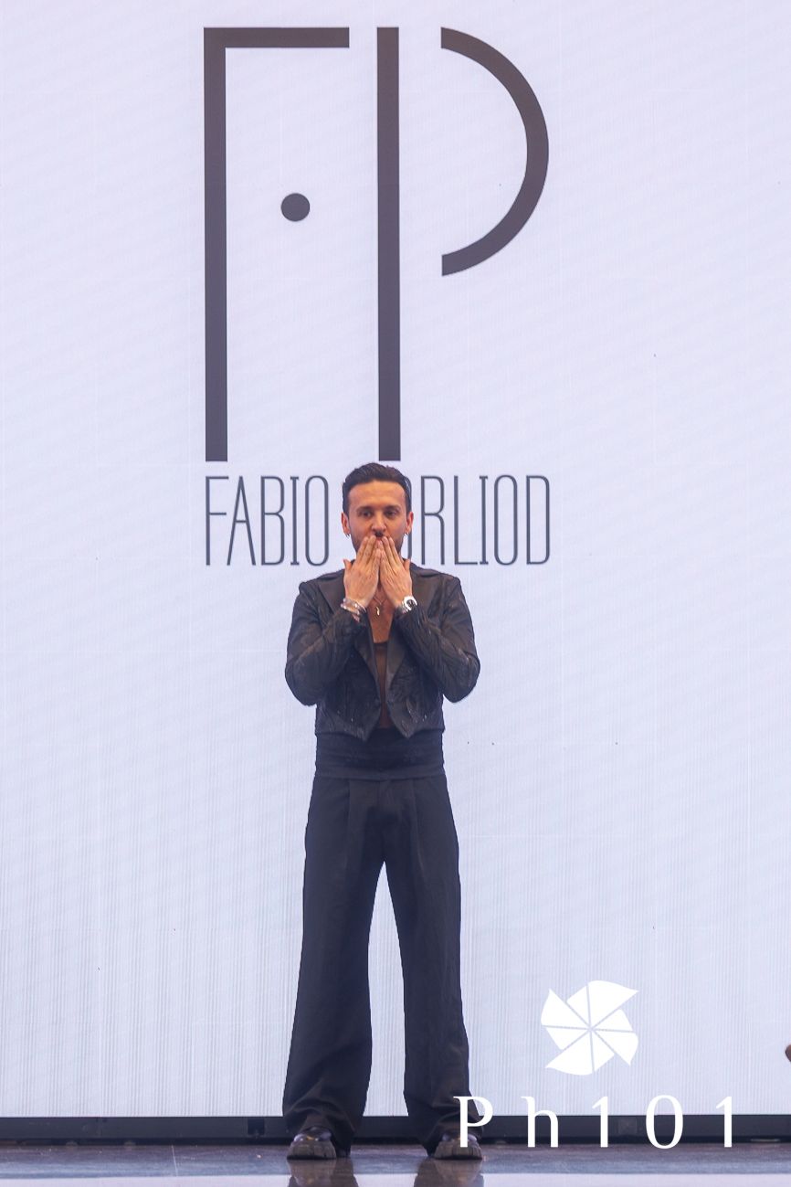 Performance art sequence showing figure in black against white backdrop with 'Fabio Salice' text.