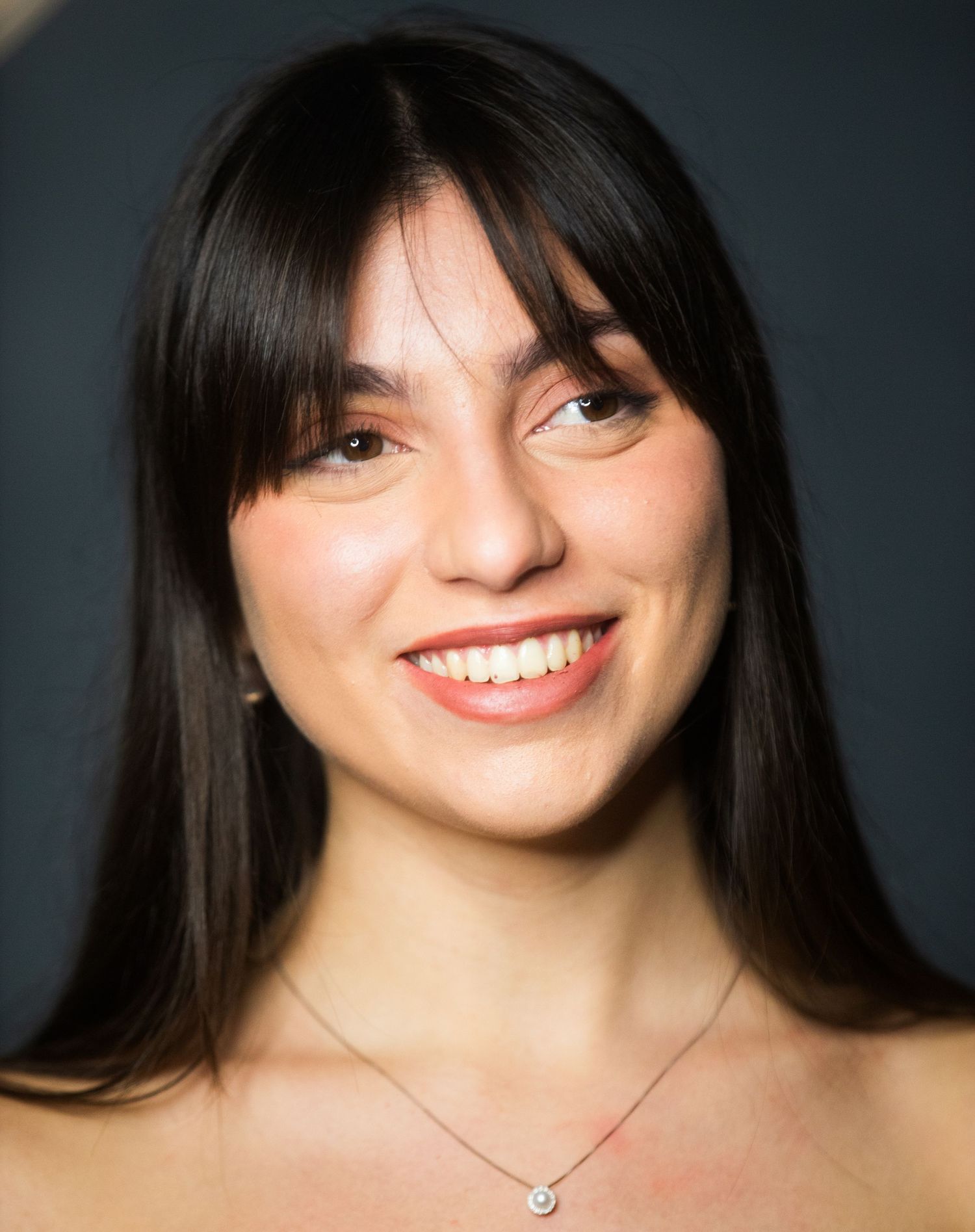 Portrait series showing expressions and poses against dark background.